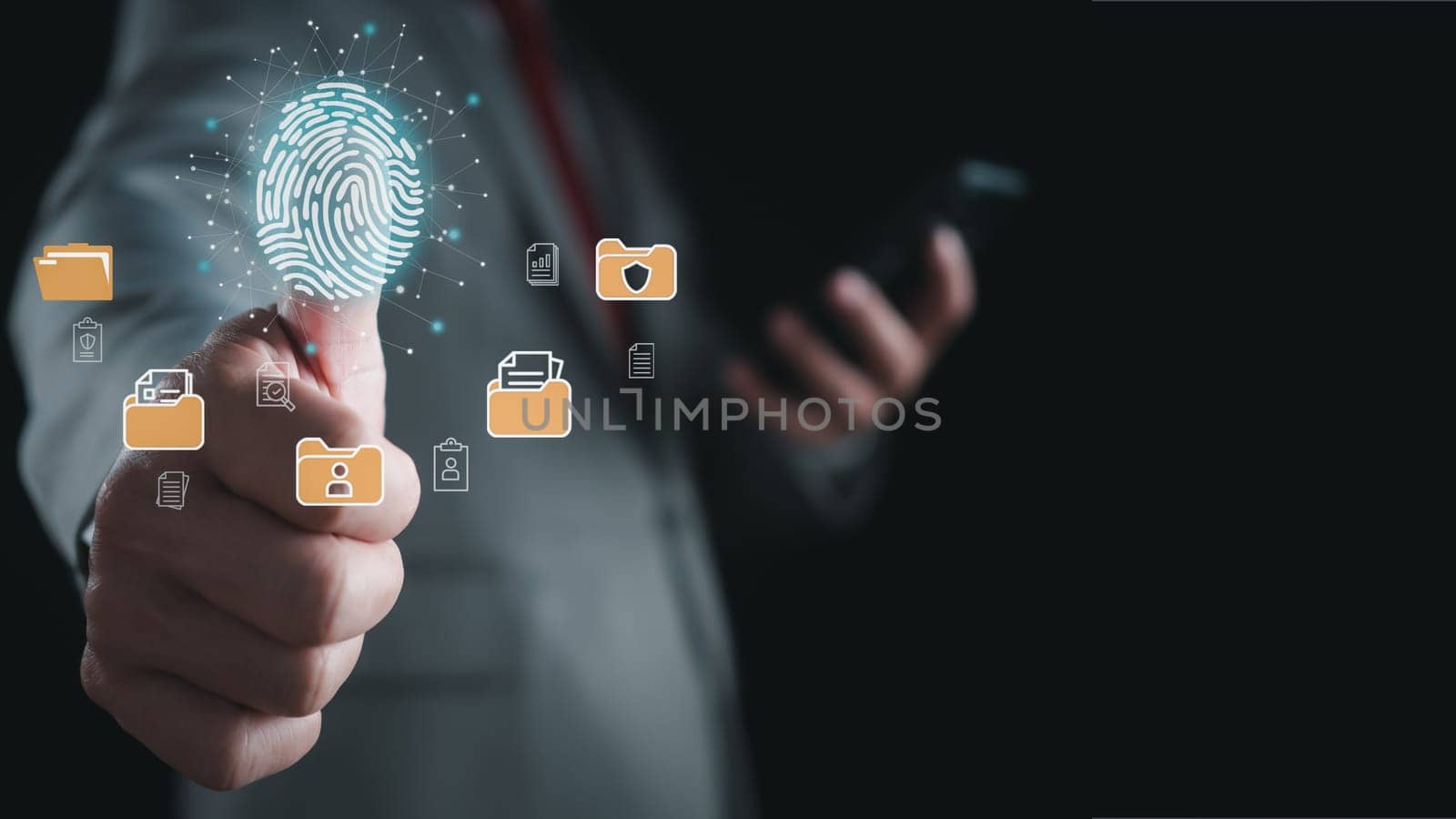 Businessman using fingerprint scanner to log in showing cyber security protection and data security concept including secure login by Unimages2527