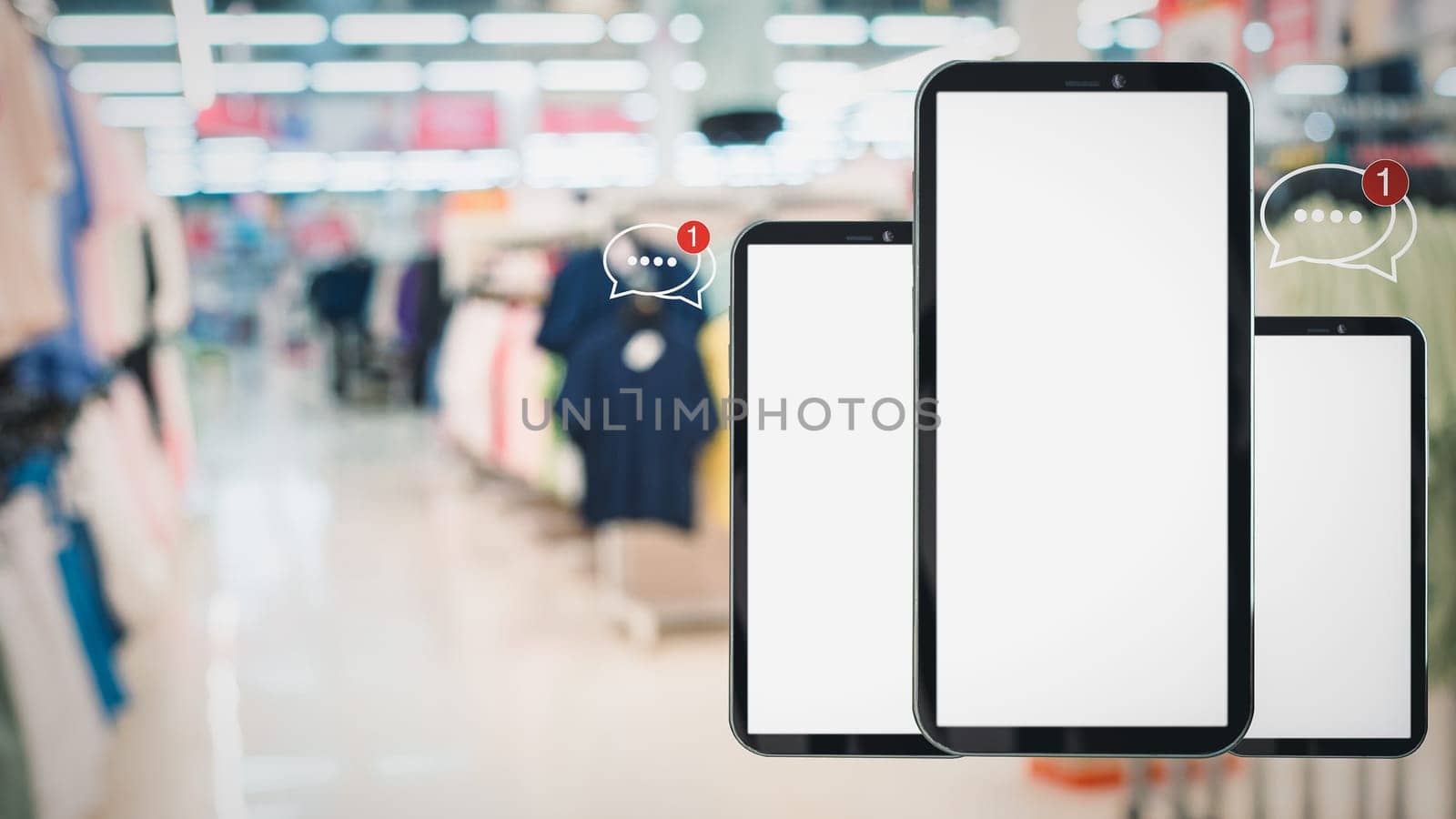 White screen smartphone with message icons isolated on background inside shopping mall. online shopping Website, marketplace platform, e-commerce technology and online payment concepts. by Unimages2527