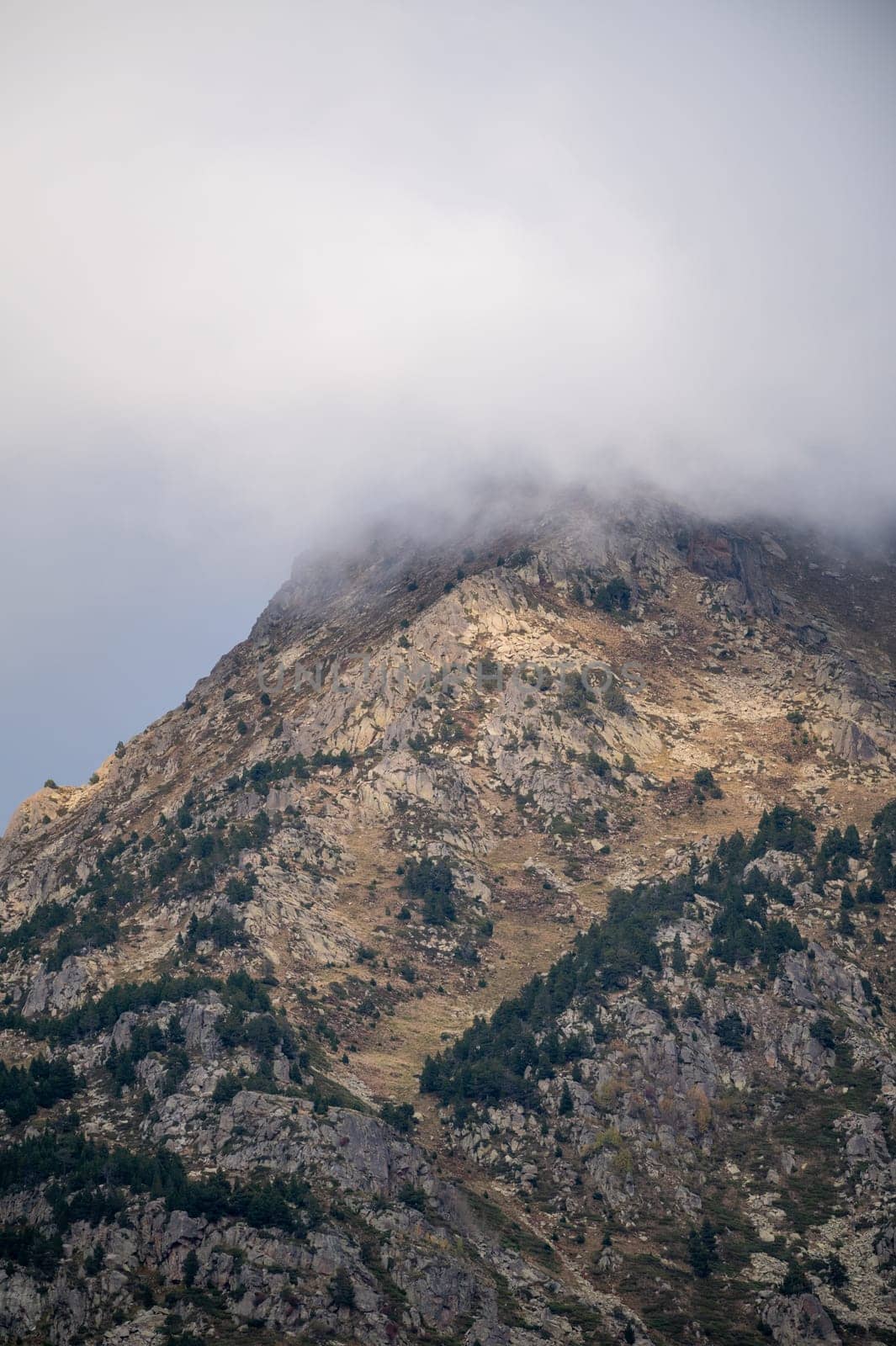 Mountain with fog in the Pyrenees in Andorra.