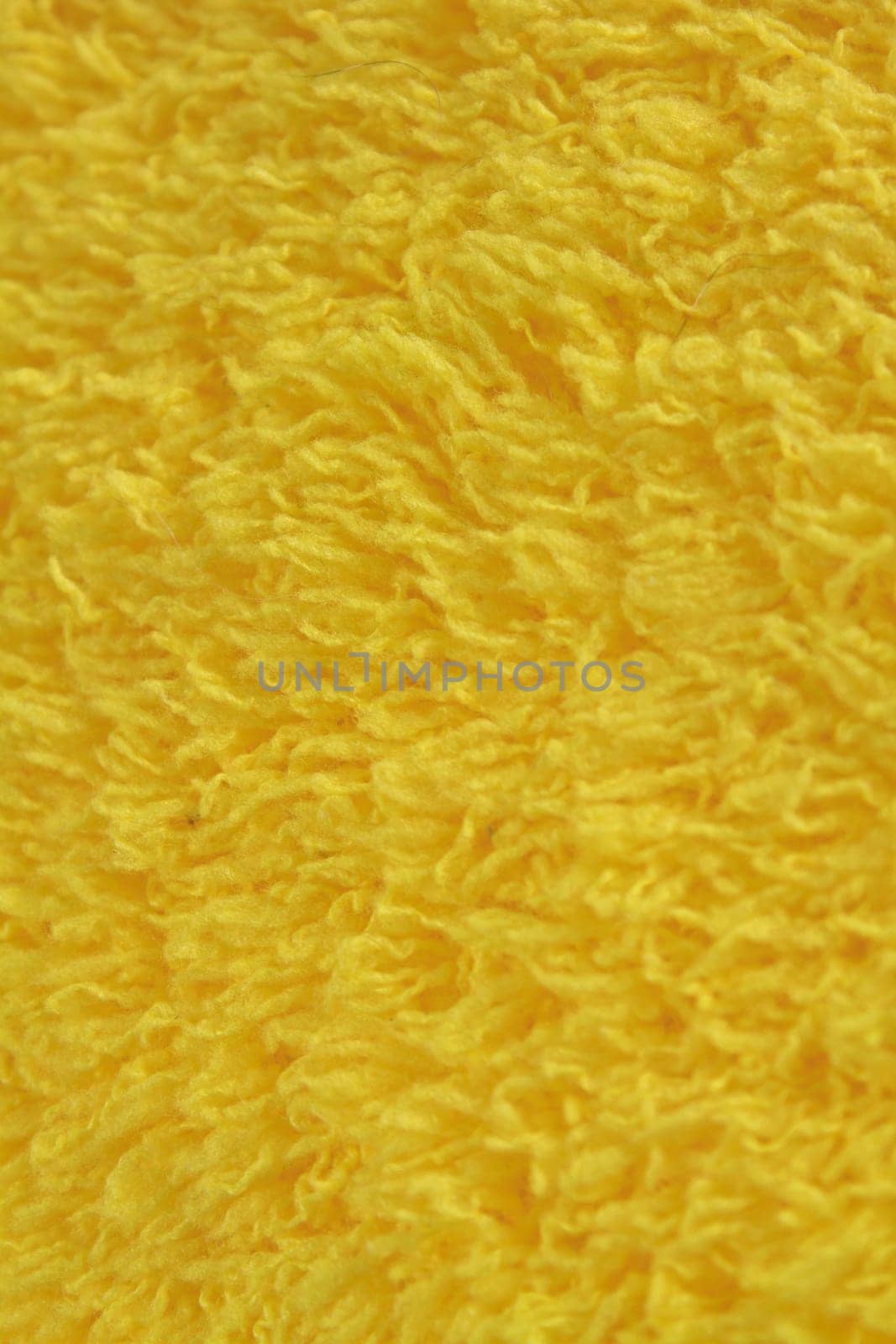 close up Yellow wool yarn background and texture