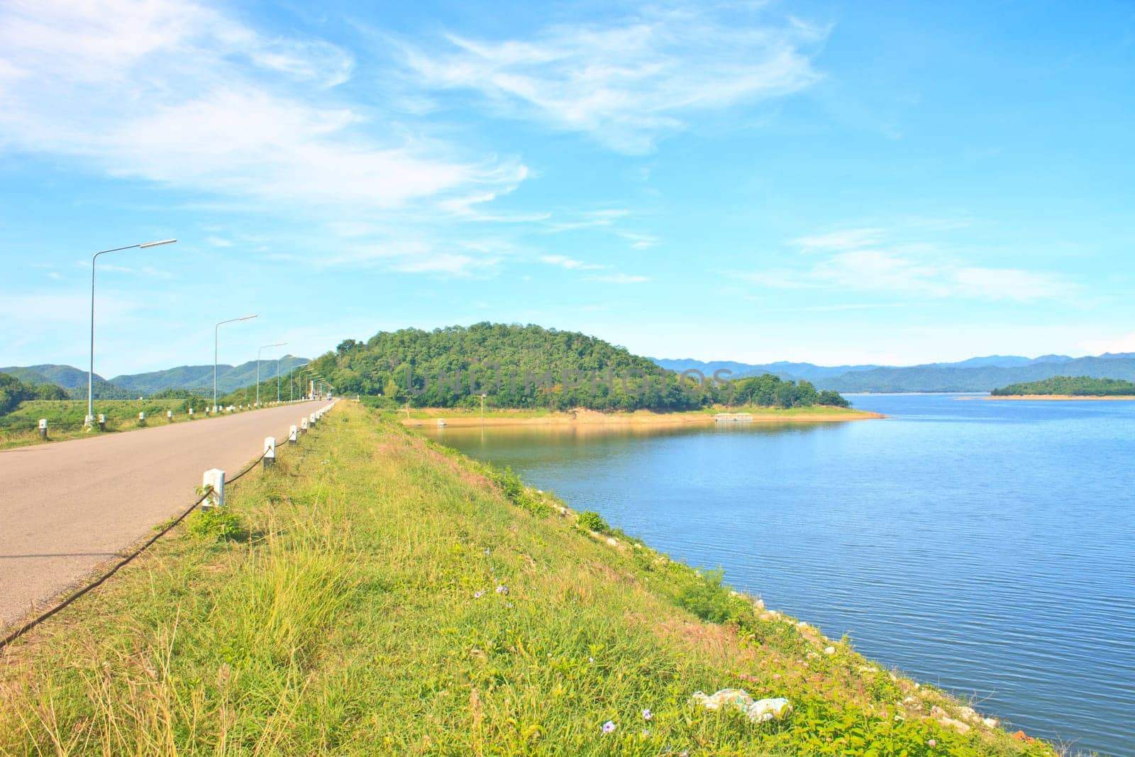 asphalt road and blue sky on top of DAM
