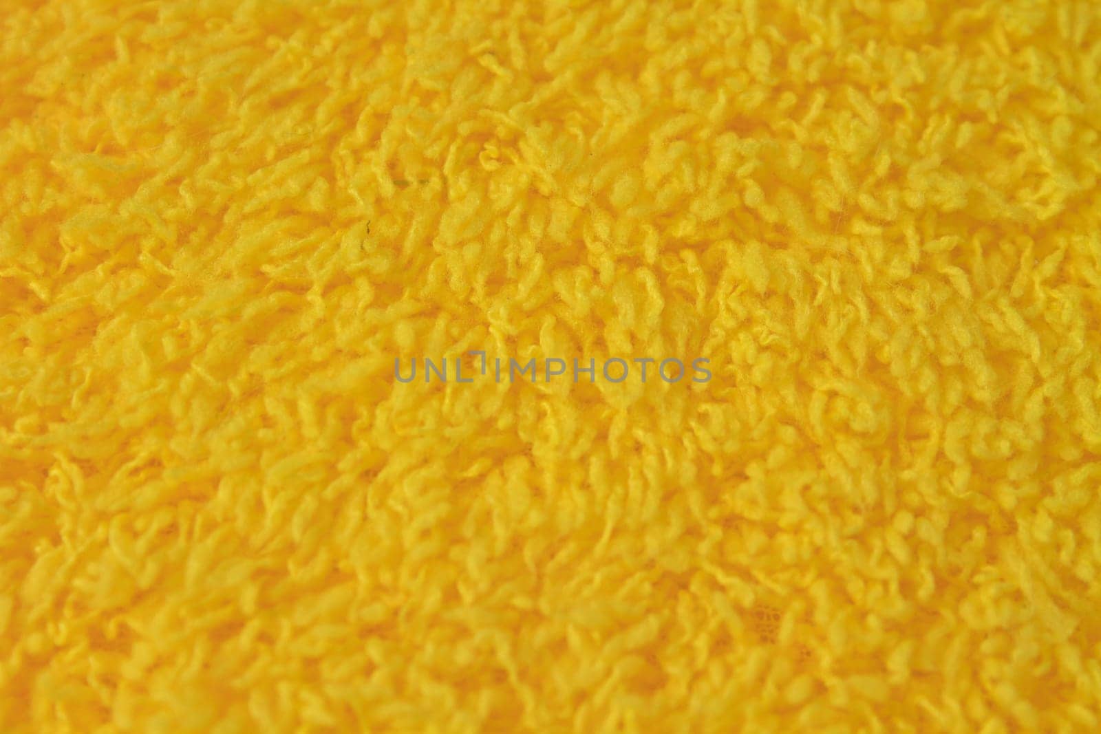 close up Yellow wool yarn background and texture