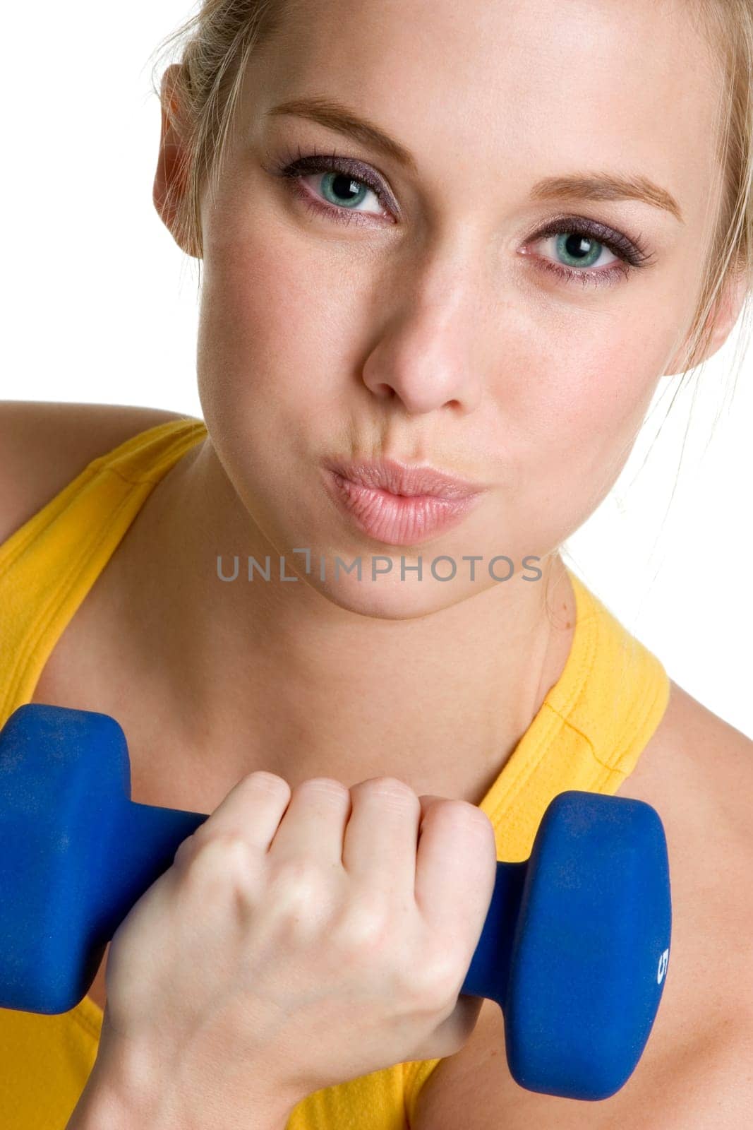Pretty fitness girl lifting weights