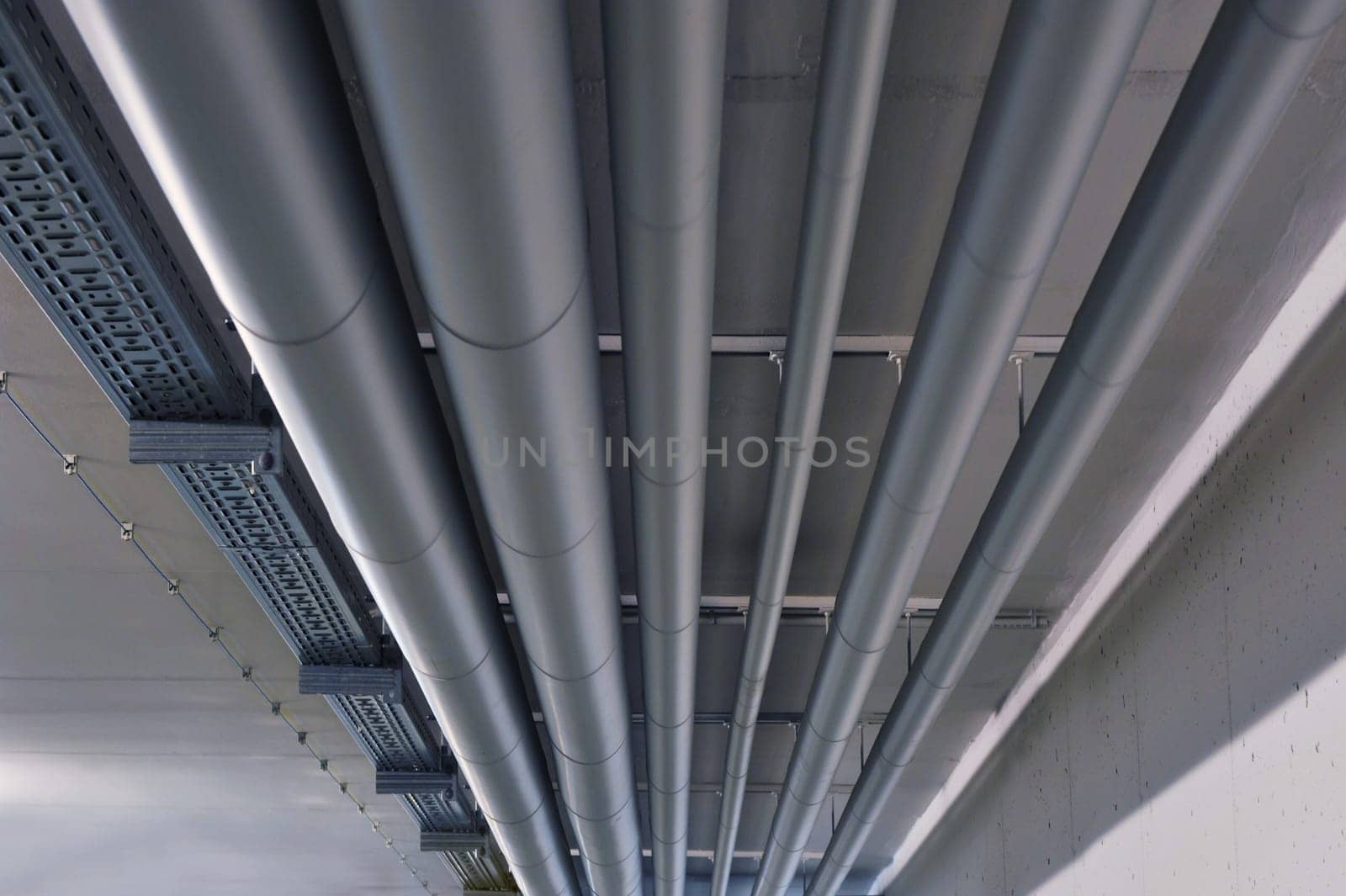 various industrial pipelines and cables in the basement