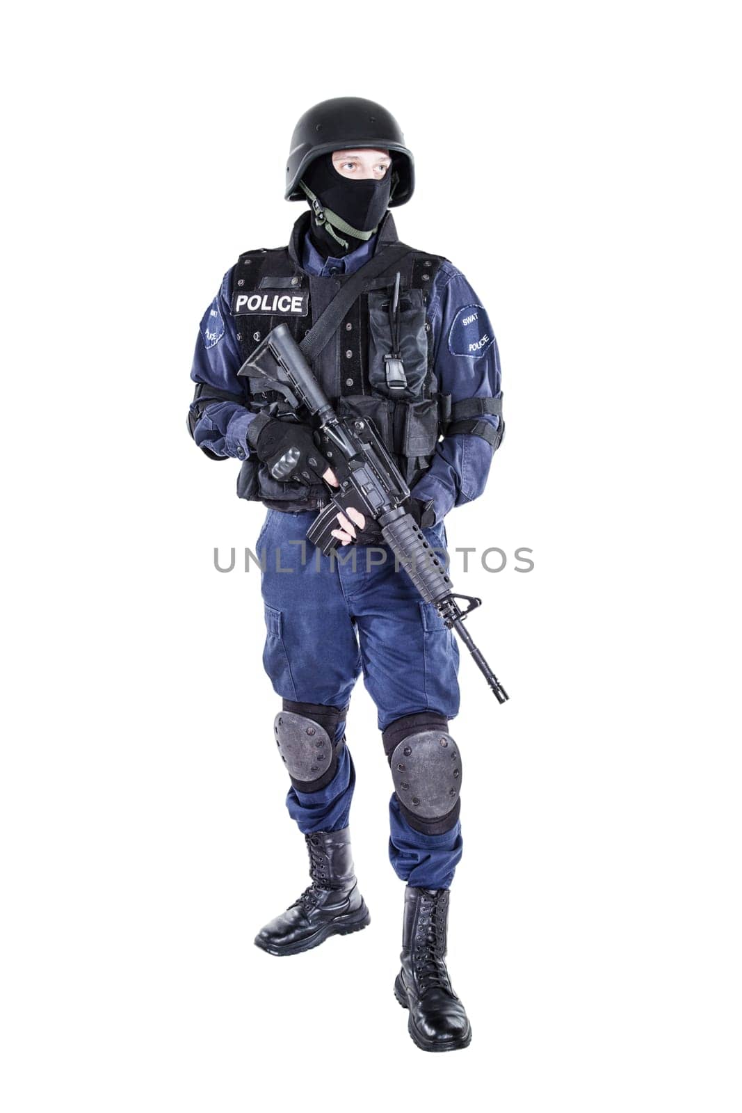 Special weapons and tactics SWAT team officer with his gun