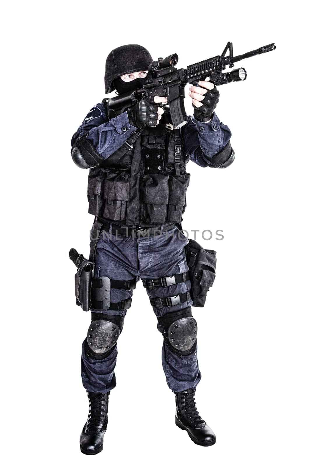Special weapons and tactics SWAT team officer with his gun