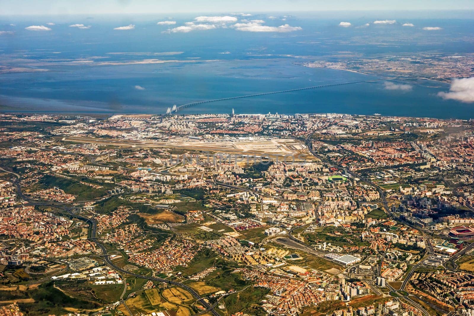 View over Lisbon, Portugal with airport, ponte vasco da gama, river tejo