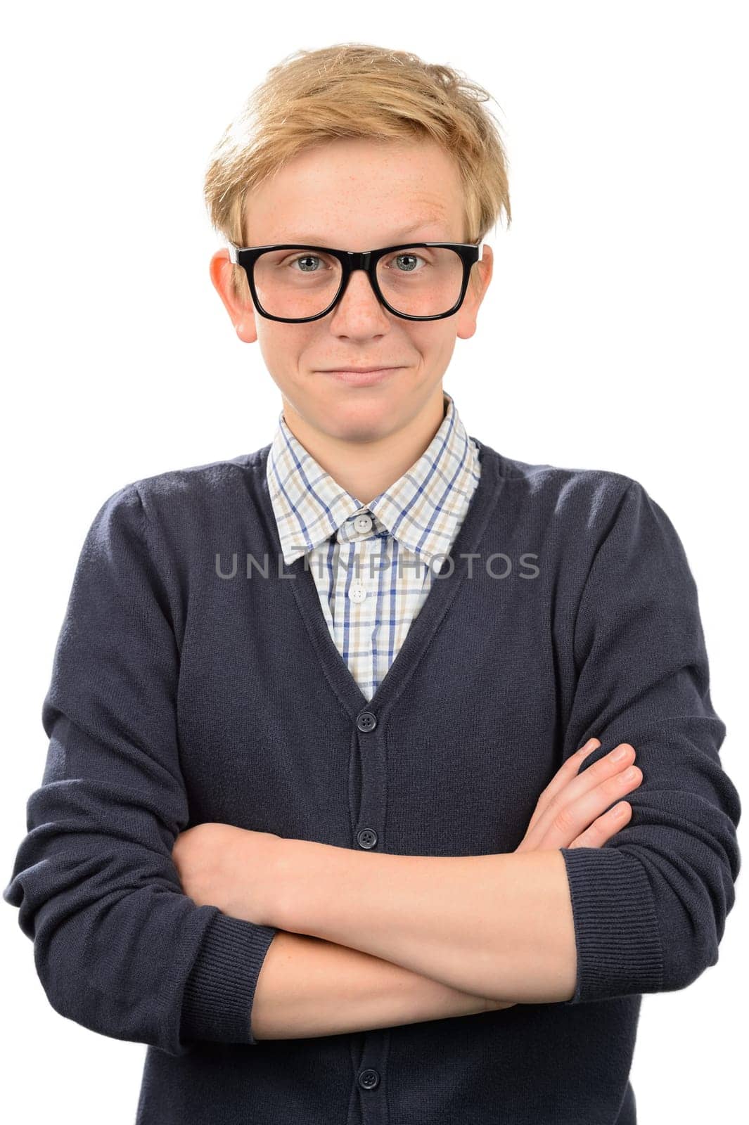 Confident nerd boy wearing geek glasses standing against white background