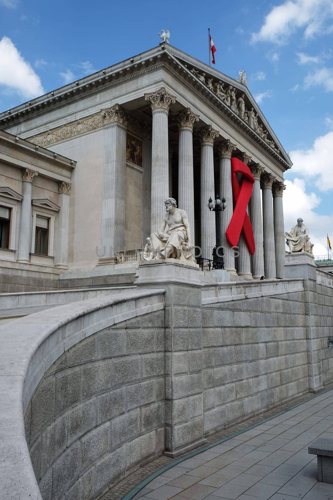 Solidarity with HIV,red ribbon to commemorate the Austrian Parliament