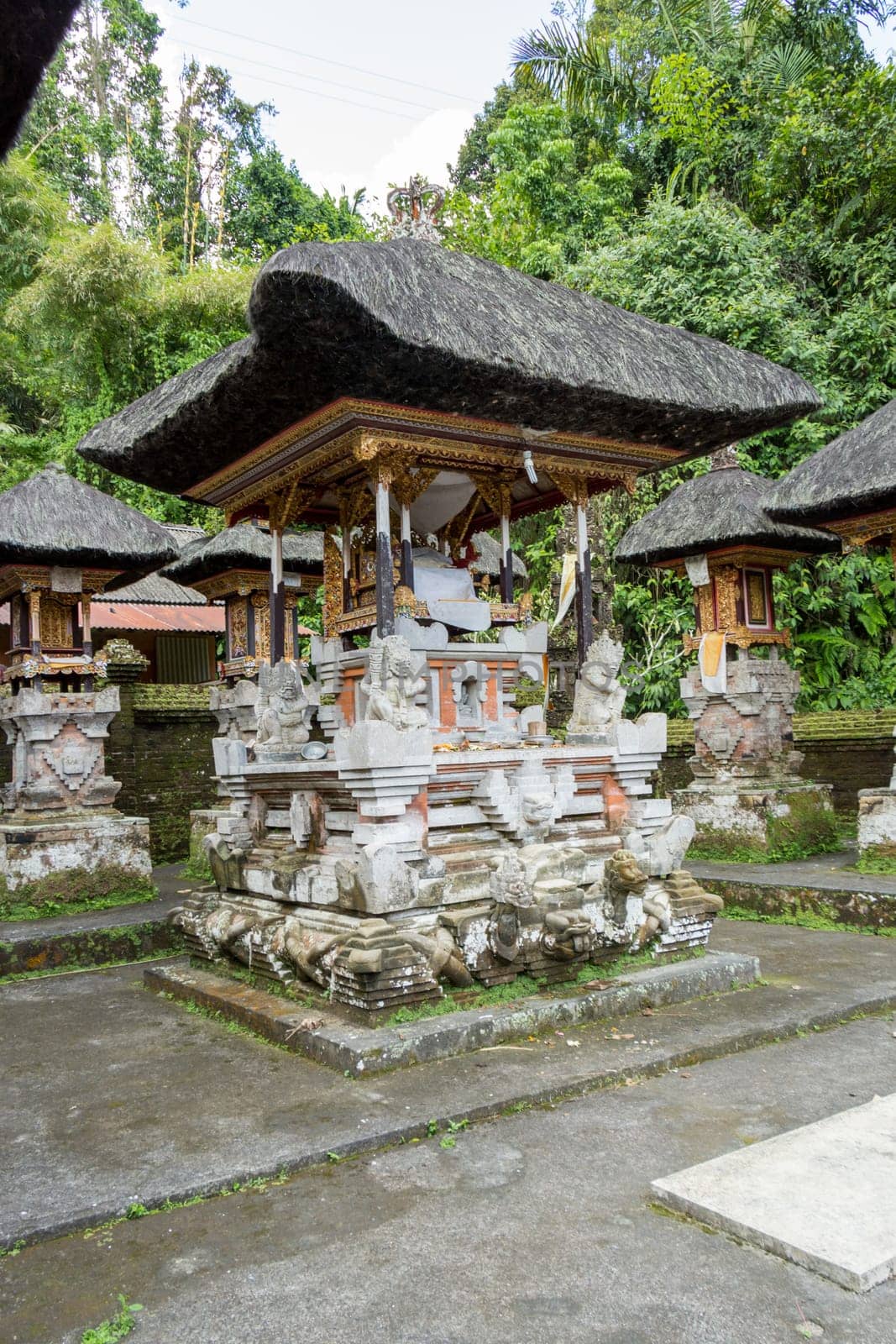 Stairs on a stone wall to an entrance to a house in Bali