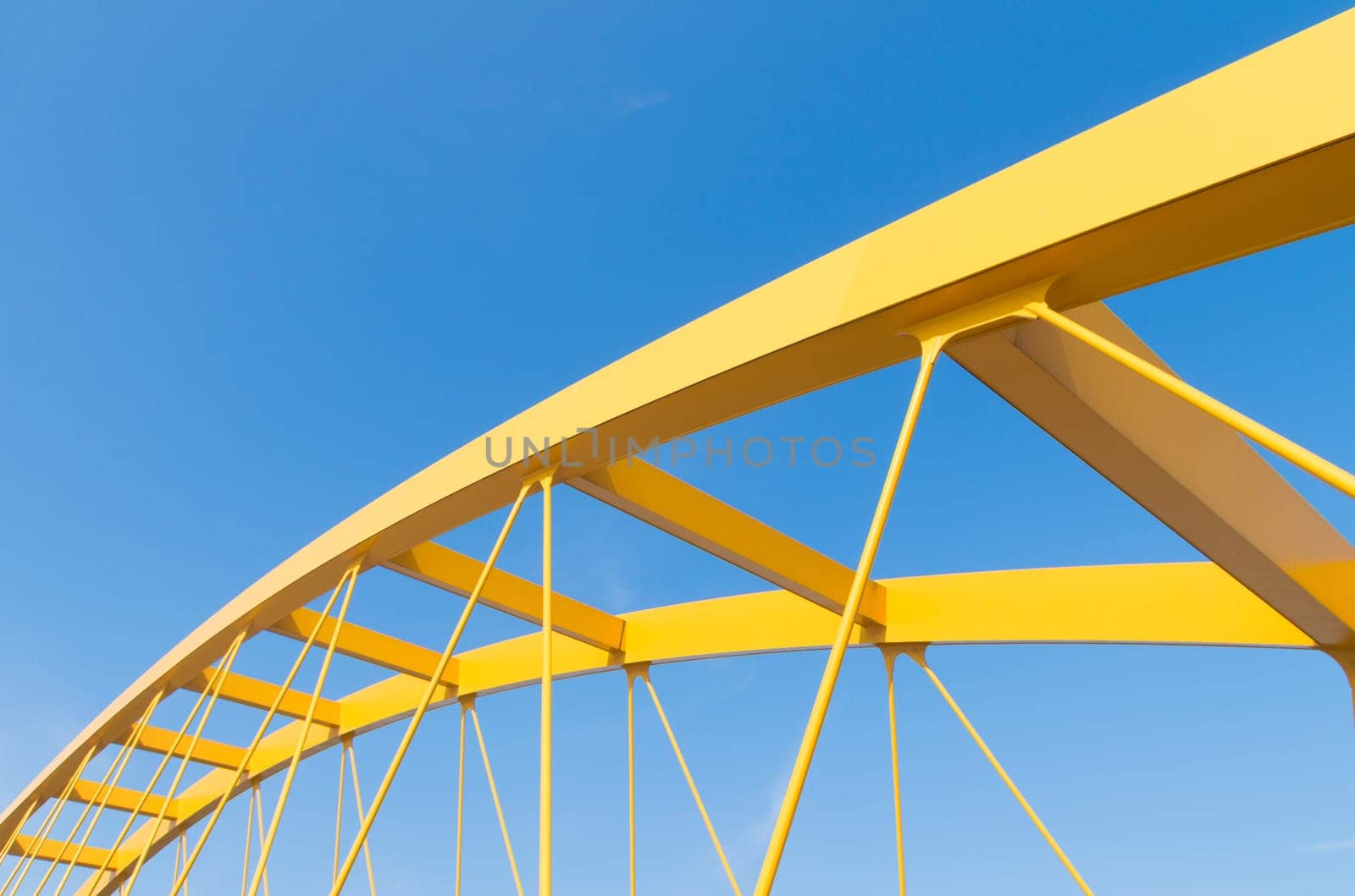 detail of the yellow arch bridge in Utrecht, netherlands. The Hogeweide Bridge is a steel arch bridge over the Amsterdam-Rhine Canal