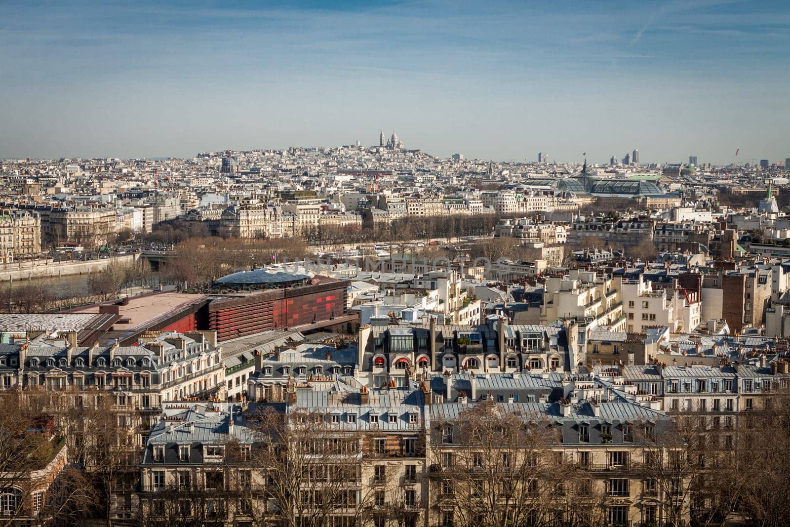 Skyline of Paris with cityscape on the Saine with blue sky in summer