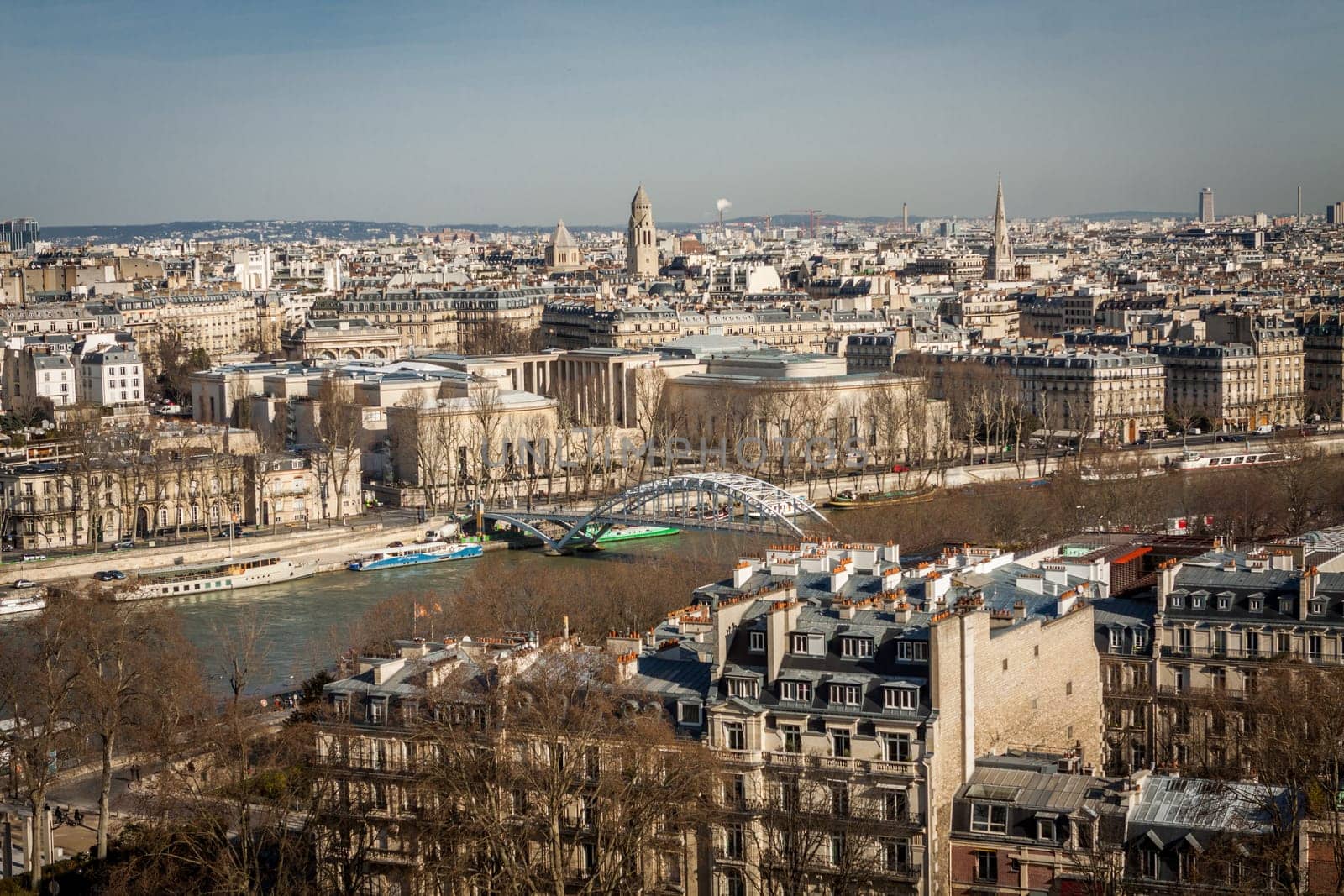 Skyline of Paris with cityscape on the Saine with blue sky in summer