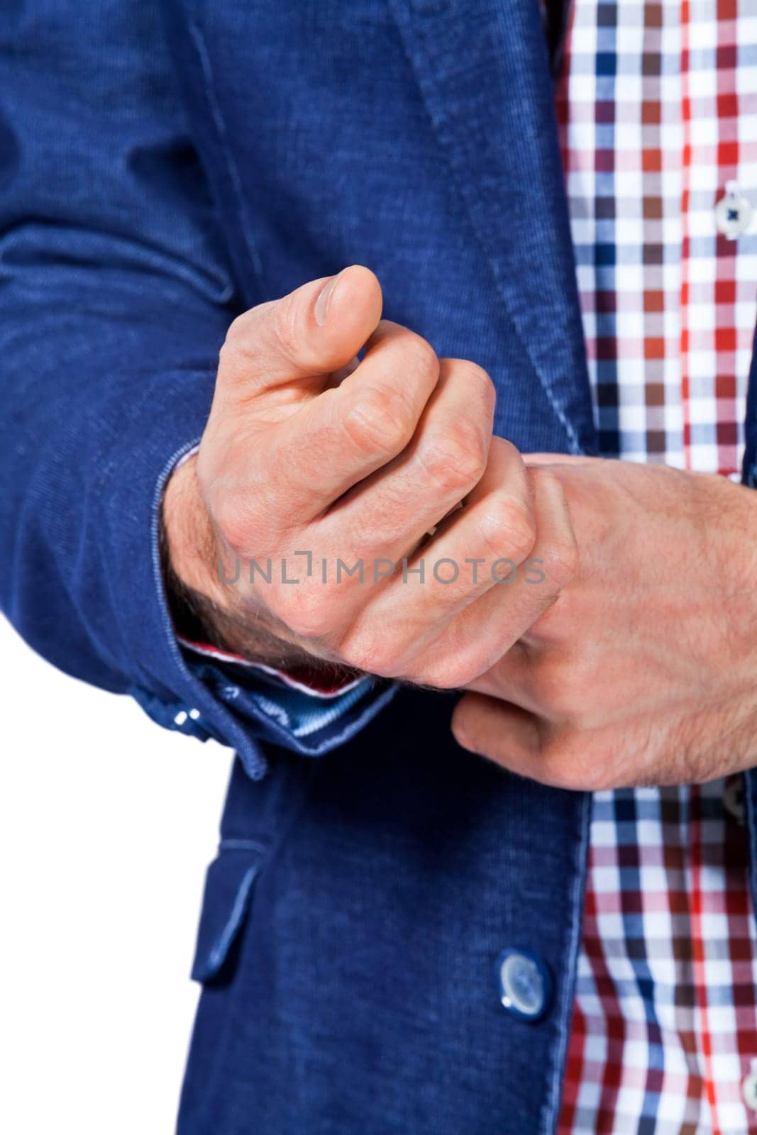 Young man in trendy casual look with dark hair and beard isolated against a white background