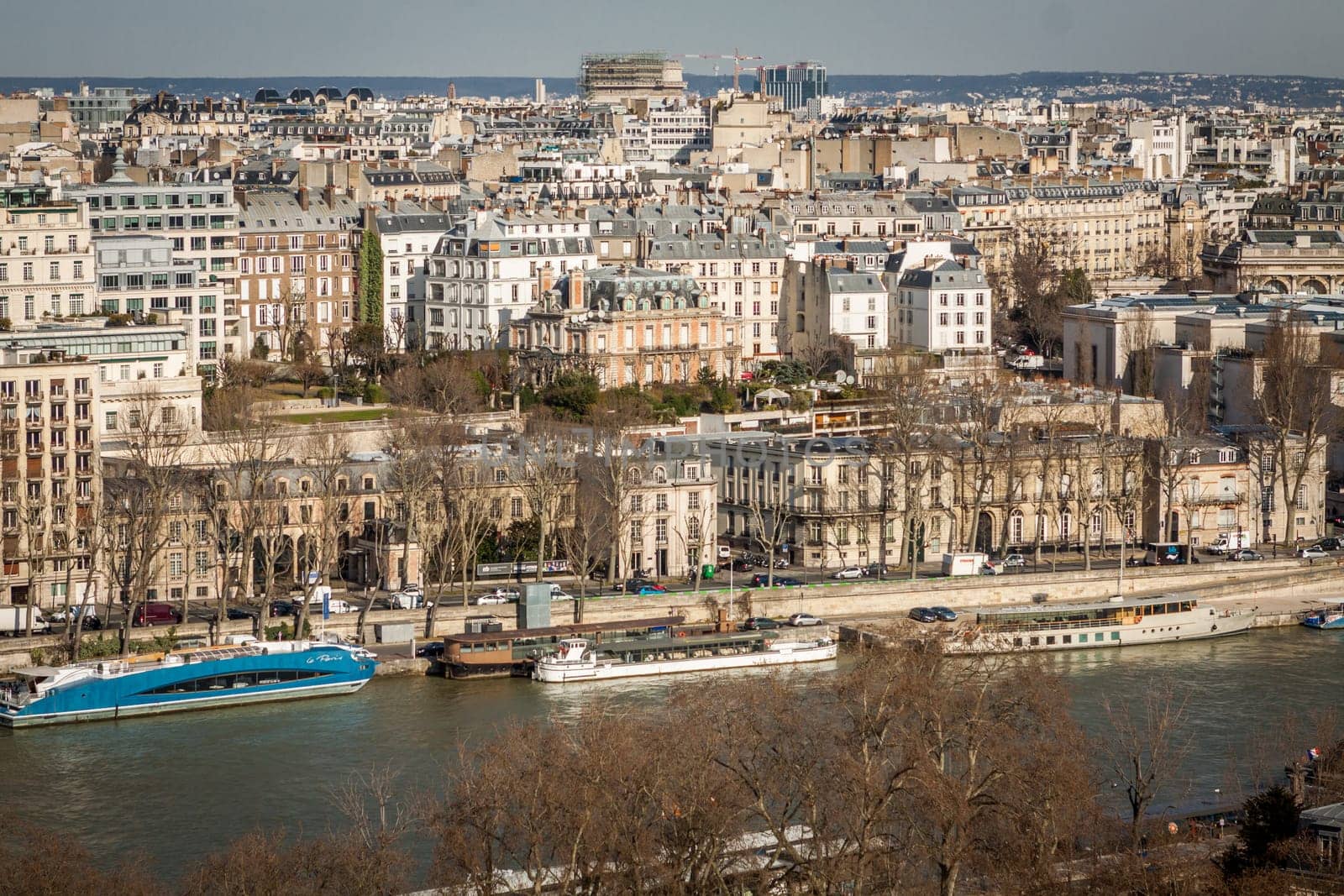 Skyline of Paris with cityscape on the Saine with blue sky in summer