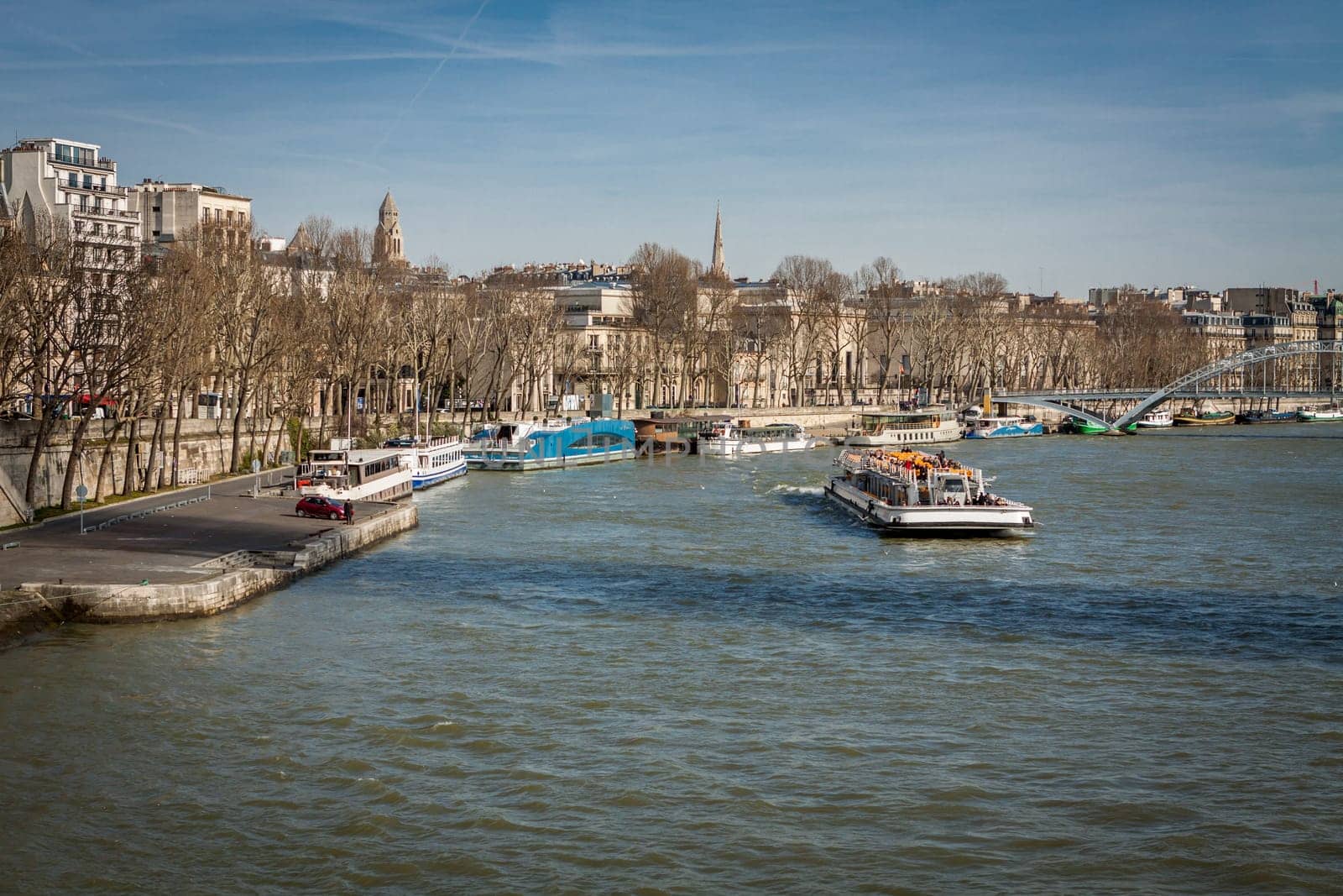 Skyline of Paris with cityscape on the Saine with blue sky in summer