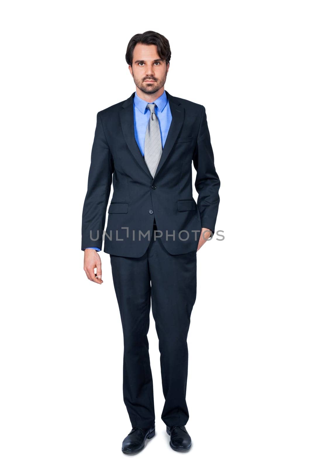 Self-proclaimed young businessman with suit dark hair and beard isolated against white background