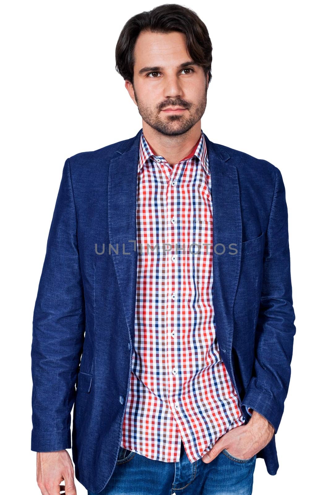 Young man in trendy casual look with dark hair and beard isolated against a white background