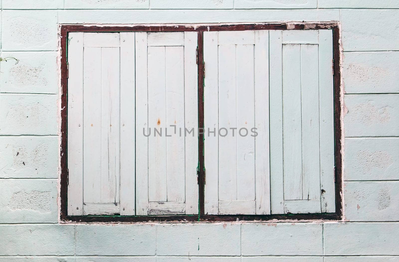 old windows on block wall,background