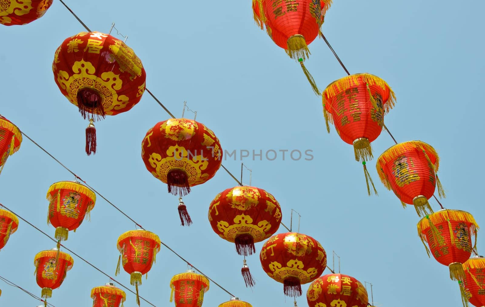 Red Chinese lanterns on blue sky