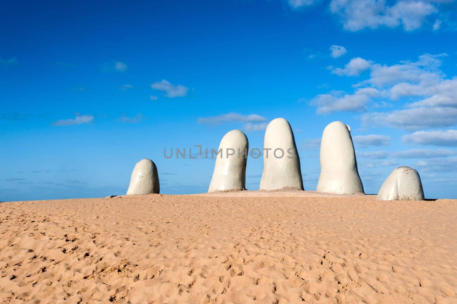 Hand Sculpture, the simbol of Punta del Este, Uruguay. It's a plastic work standing here since the summer of 1982, when the Chilean artist Mario Irrazábal was invited to take part in the 1st International Meeting of Modern Sculpture in the Open Air held in the City of Punta del Este. .