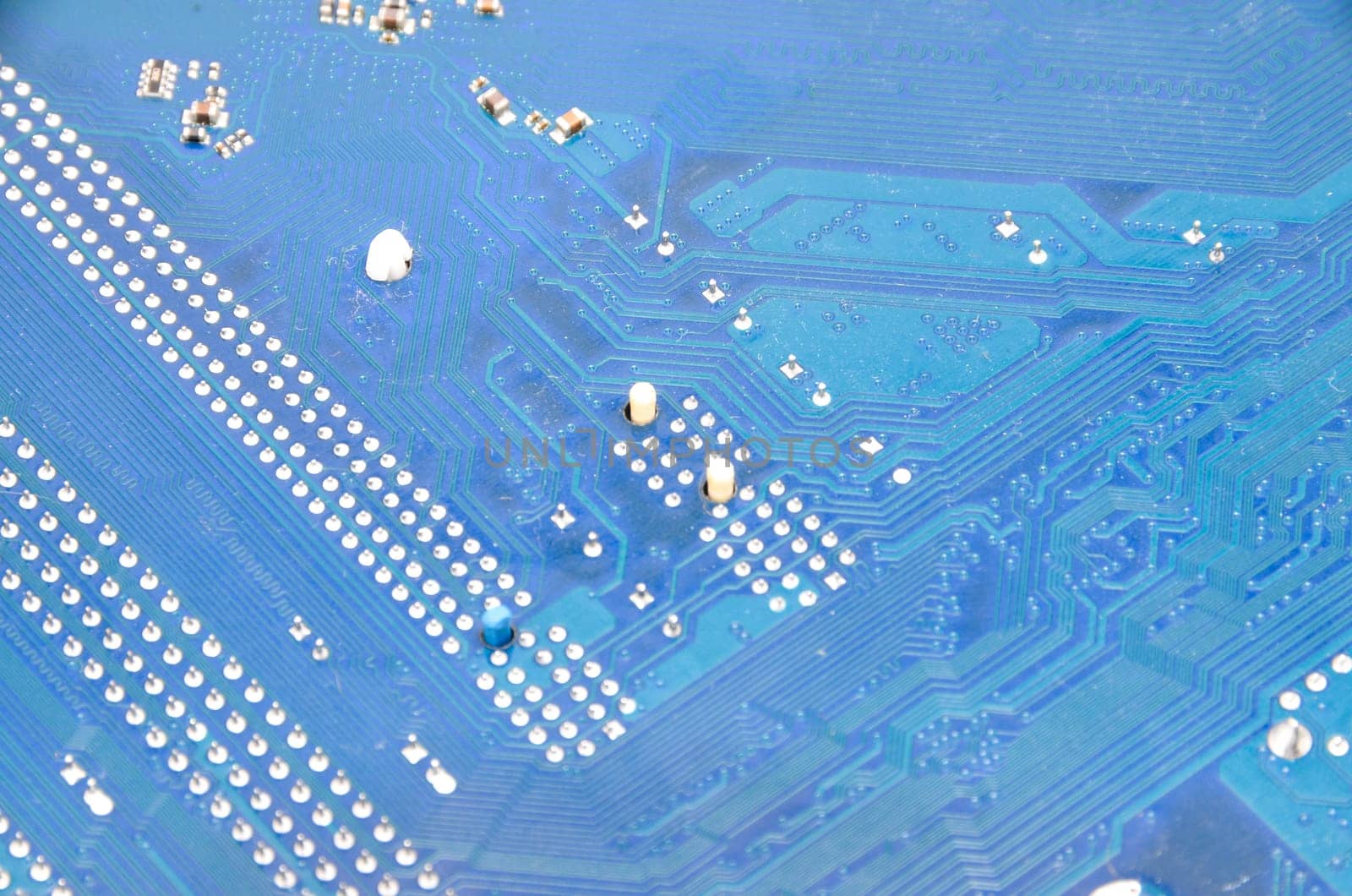 Macro Photo Of Electronic Circuit. Pcb On The Lighting.