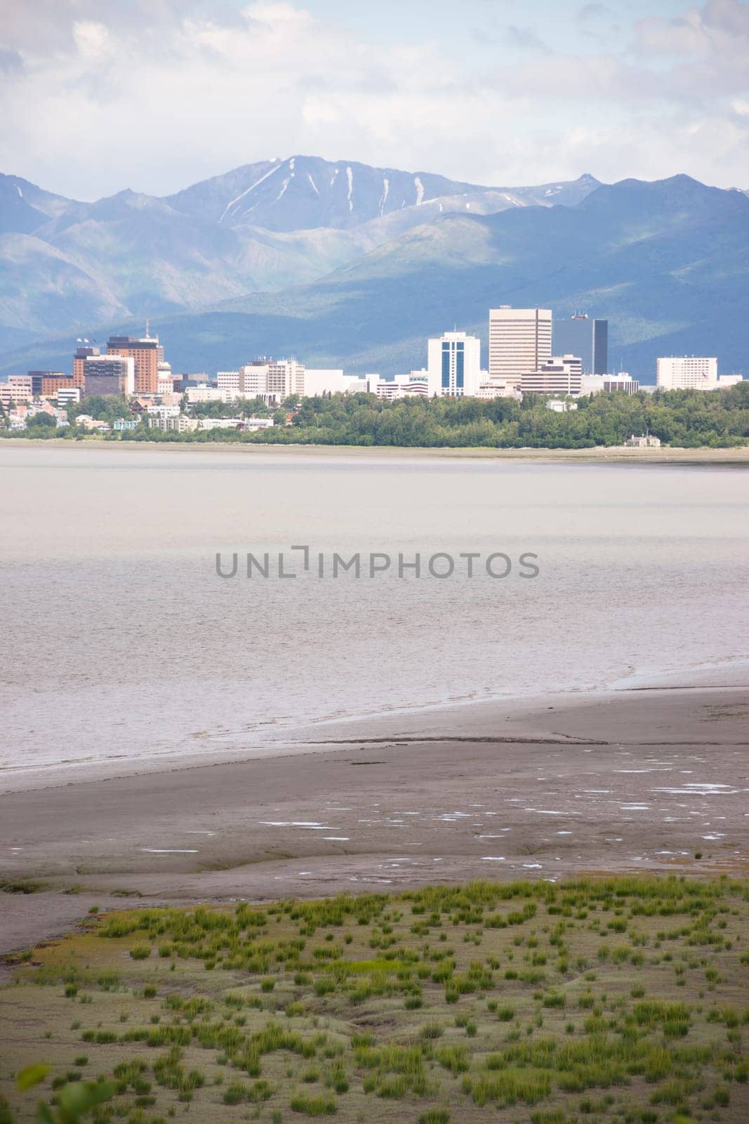 Sandy beach bay Anchorage Alaska downtown city skyline