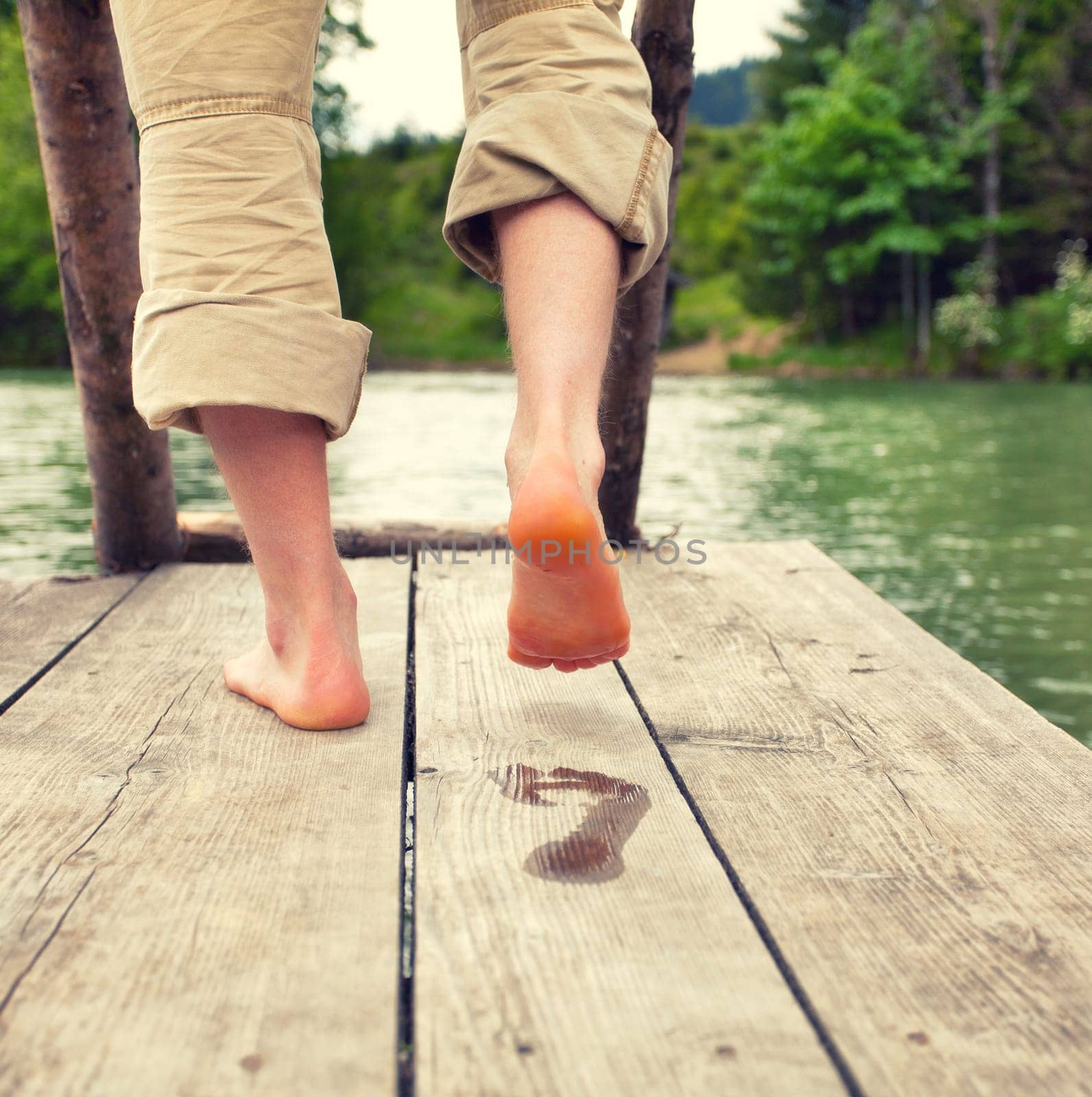 barefoot at the bathing jetty
