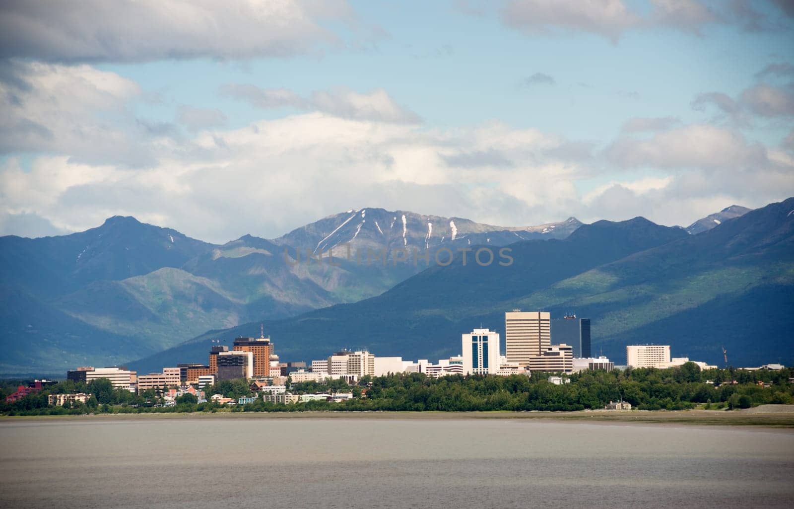 Sandy beach bay Anchorage Alaska downtown city skyline