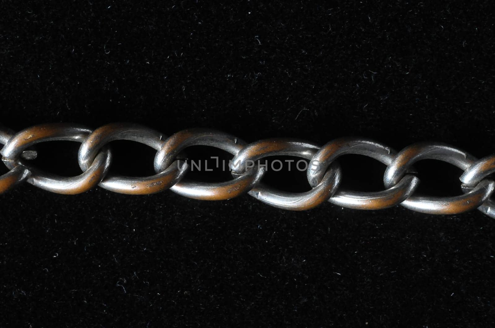 Silver Small Chain Texture on a Black Background