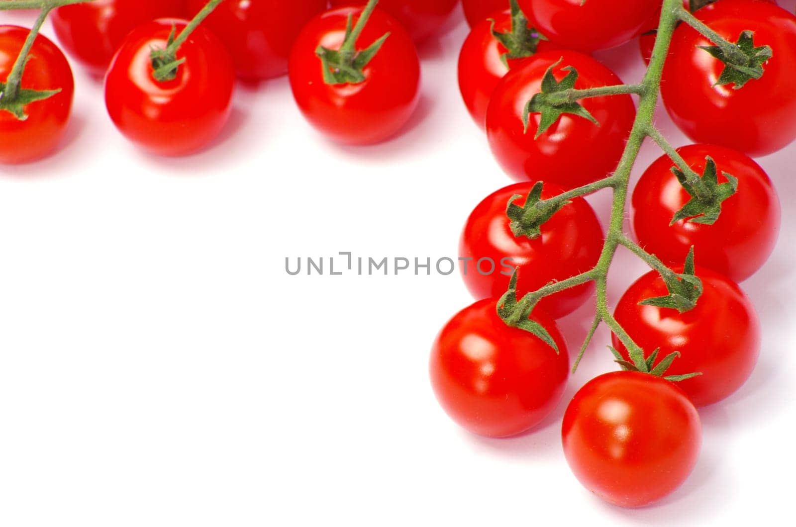 Cherry tomatoes isolated on white