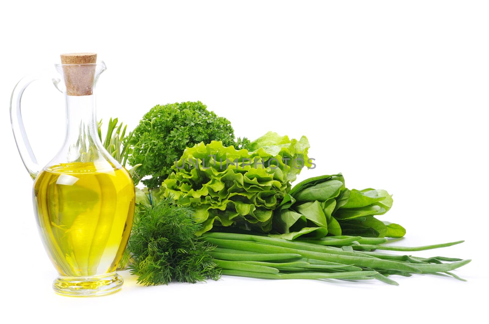 herbs and oil over white