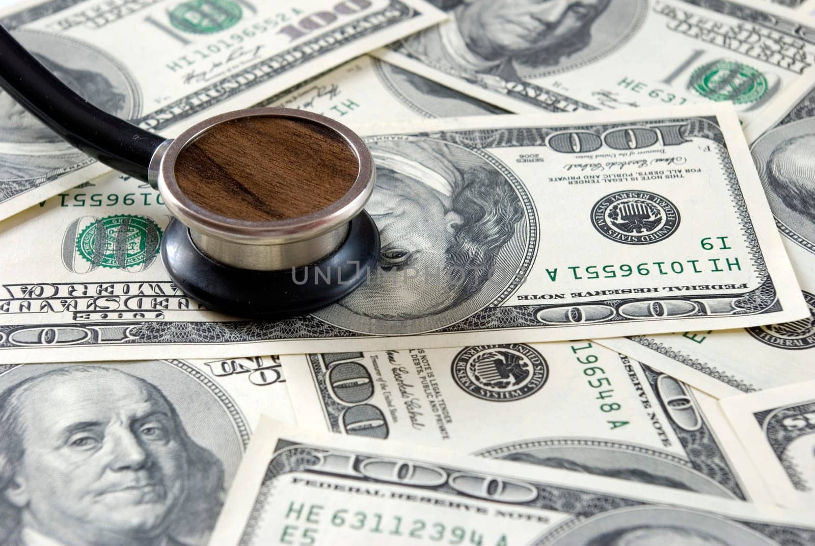 Stethoscope on money background of  dollars