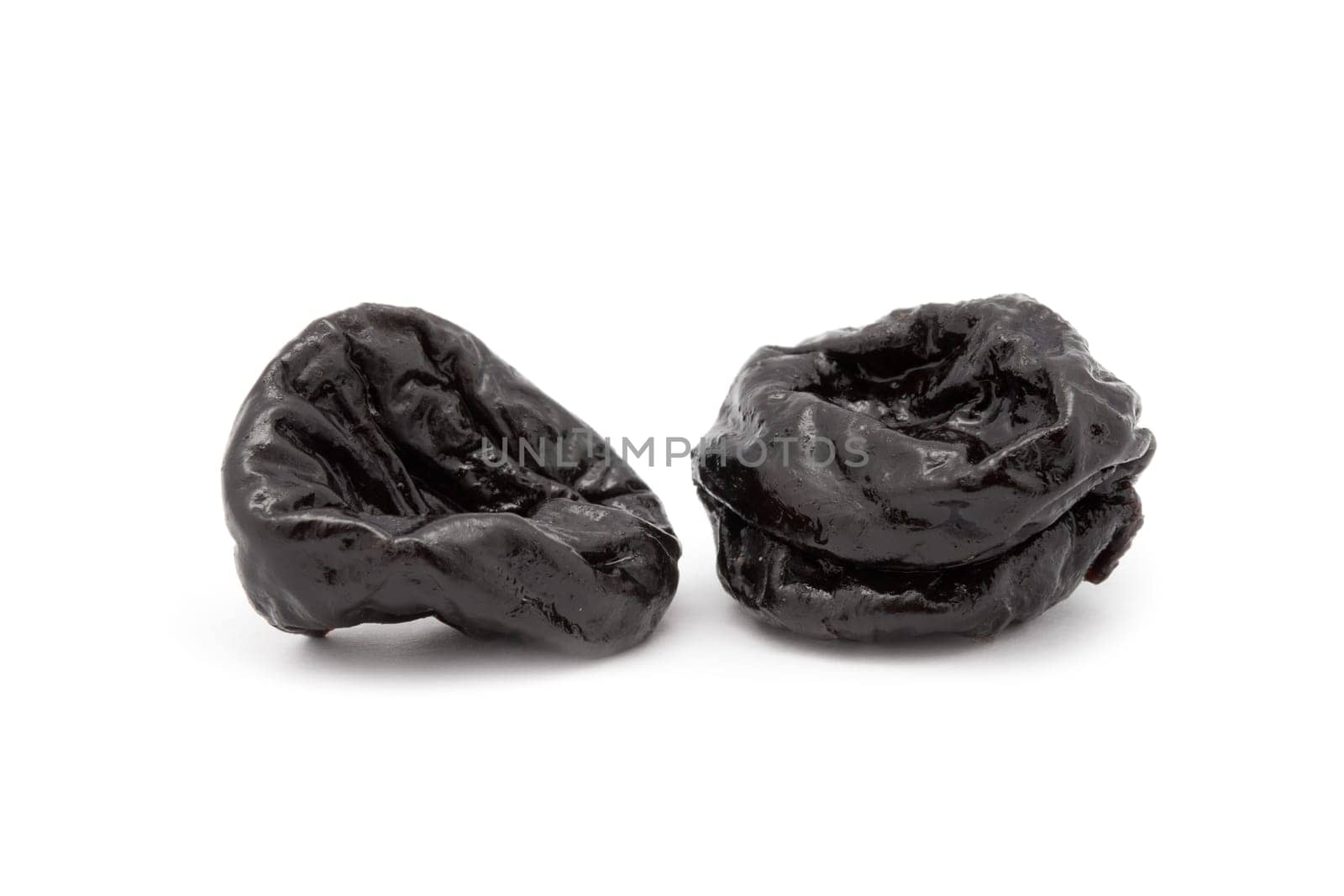 Prunes on a white background
