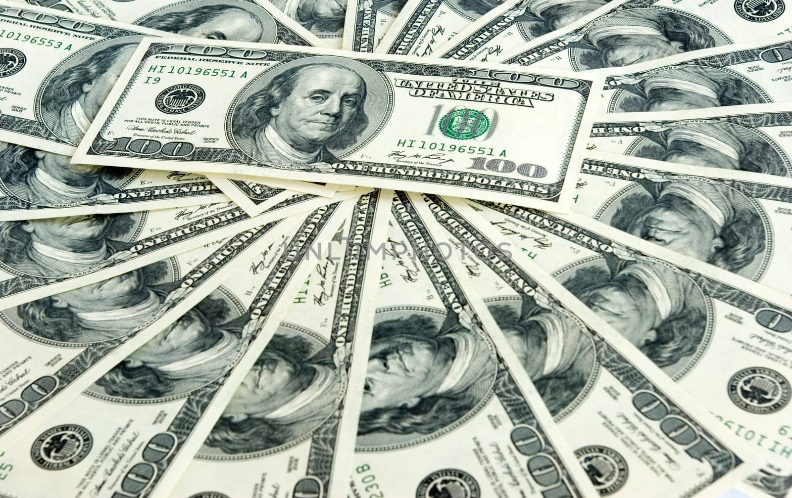 Money background from hundreds dollars