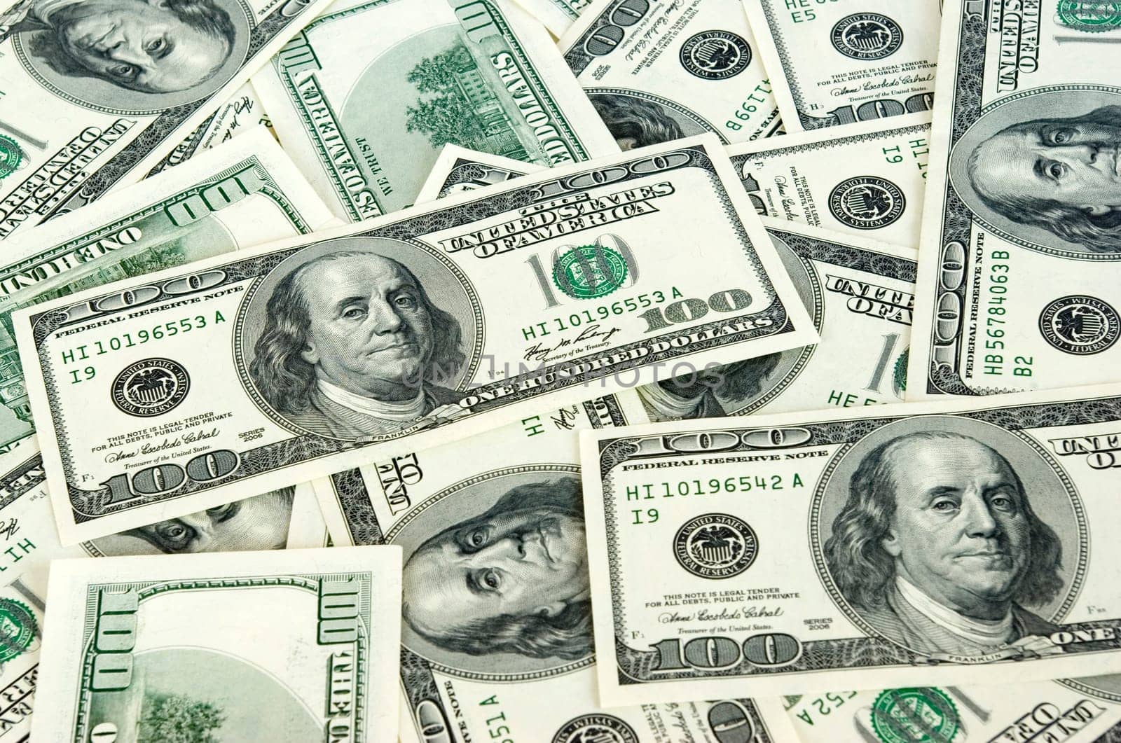 american dollars arranged at the background
