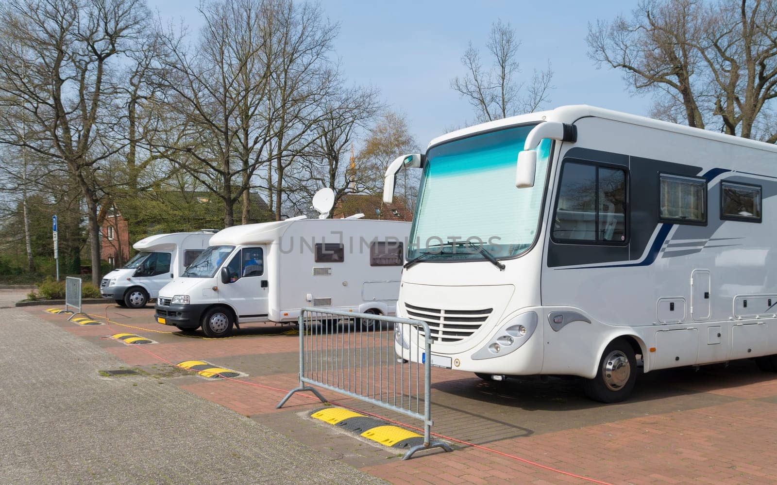 several motor-homes on a parking place