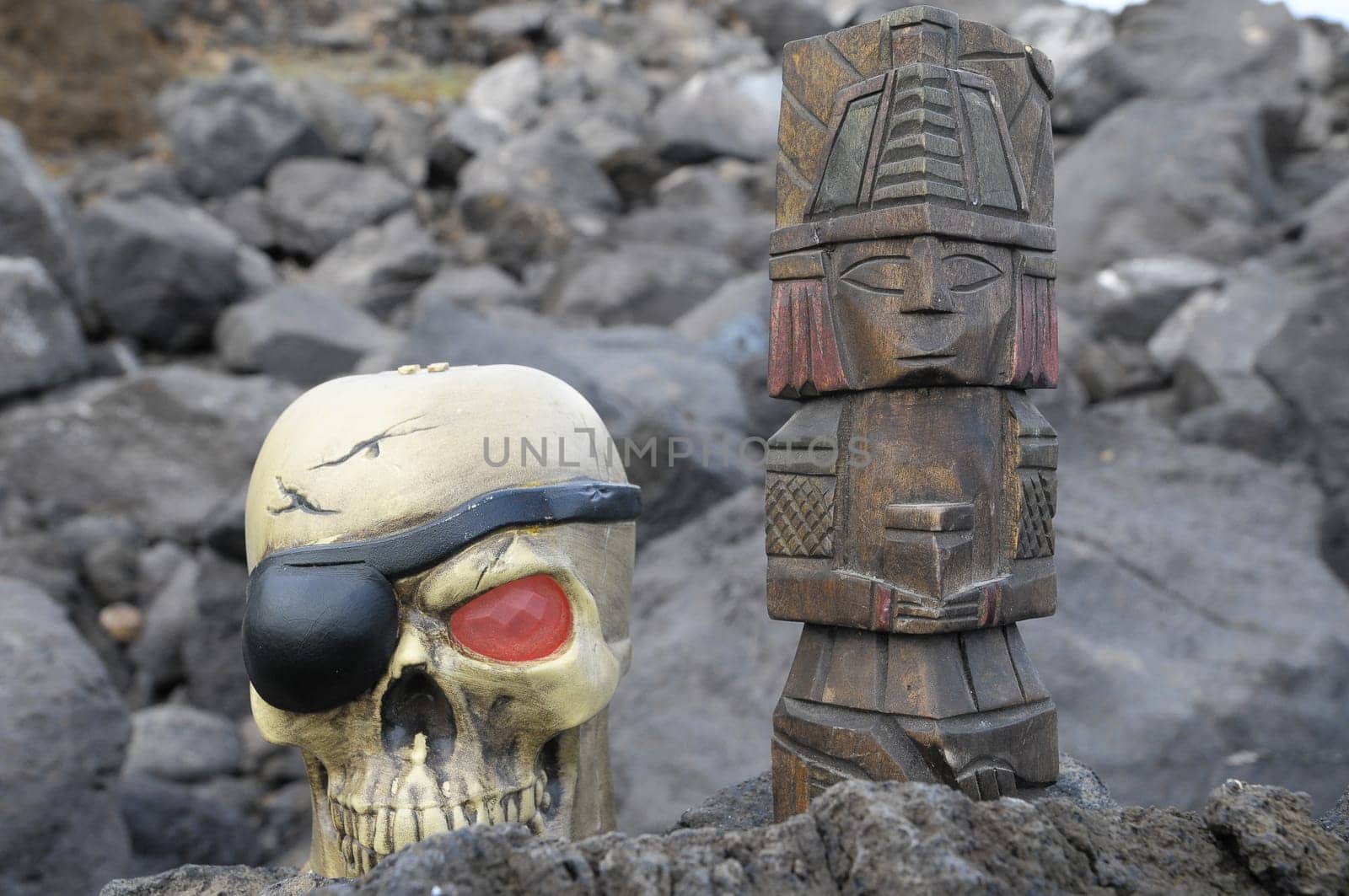 Ancient Maya Statue on the Rocks near Ocean