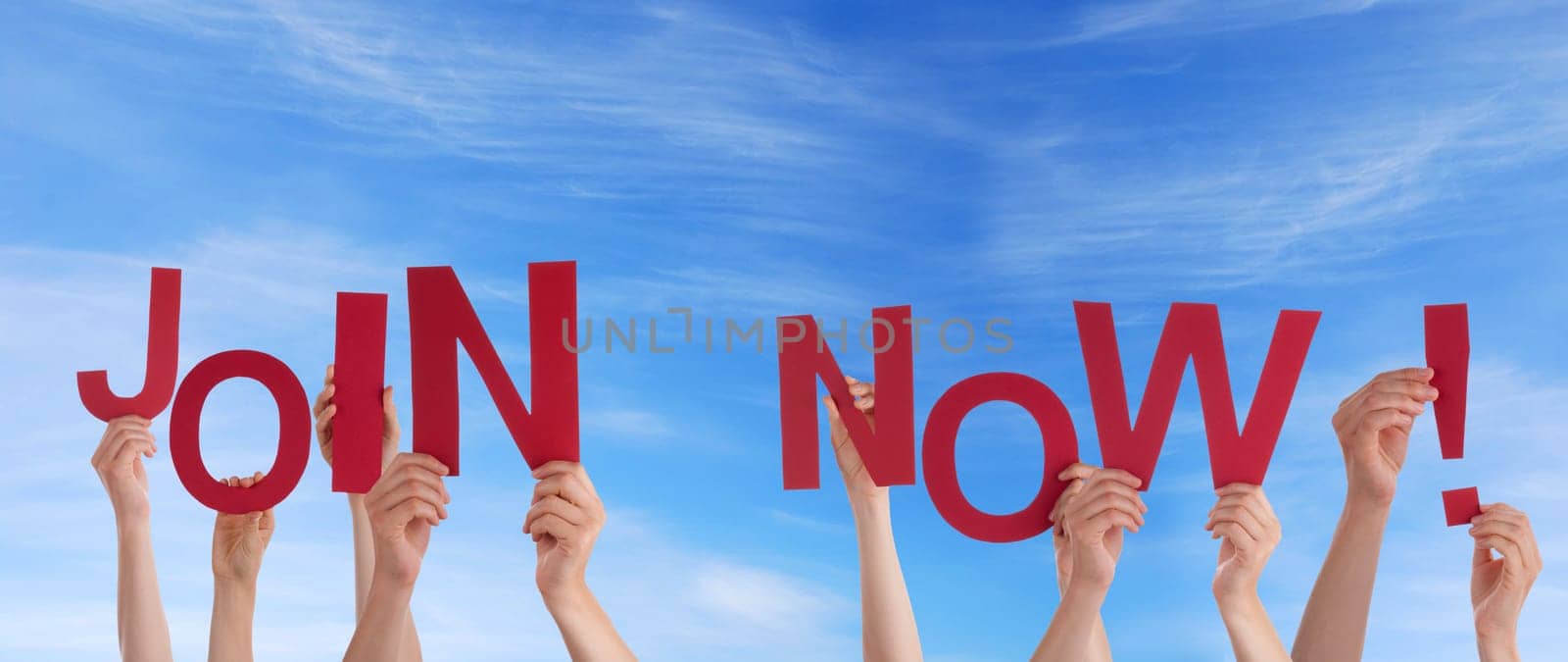 hands holding four pieces of a puzzle with copy space, gray background