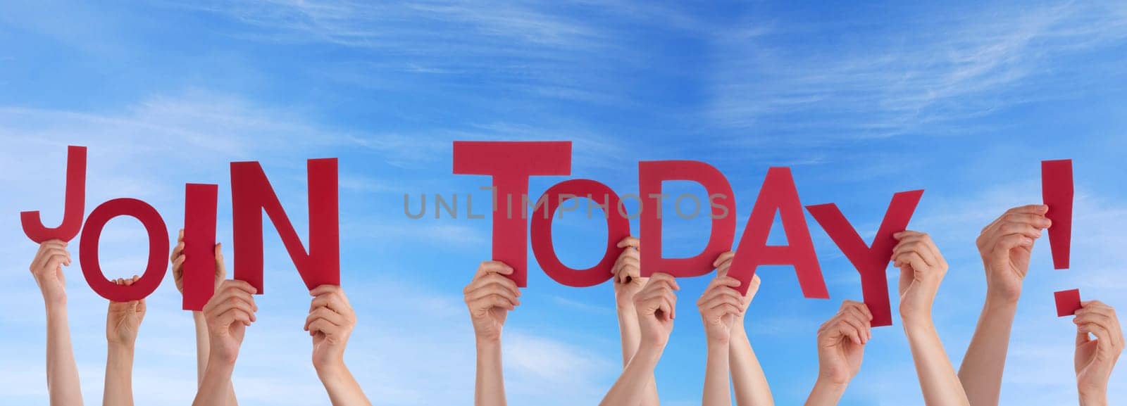 hands holding four pieces of a puzzle with copy space, gray background