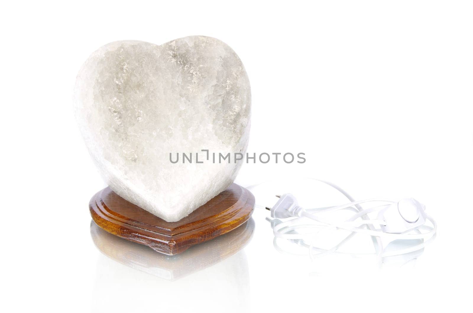 Salt rock lamp isolated over white background
