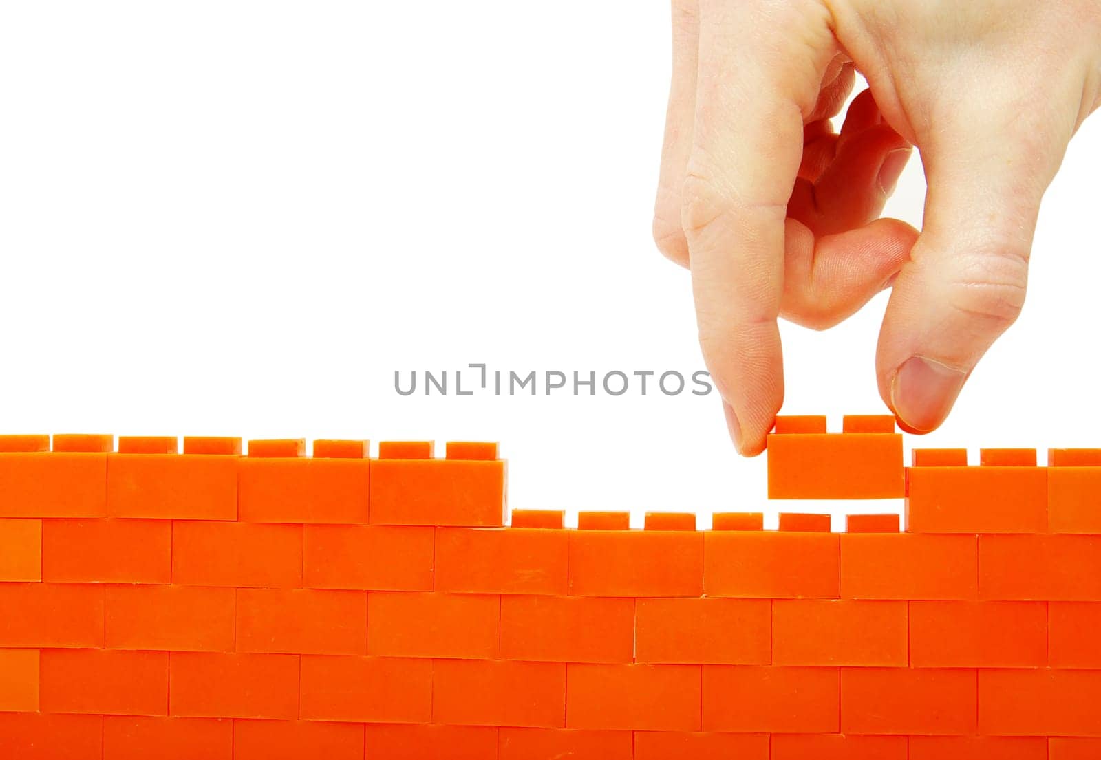 compleeting the wall on a white background