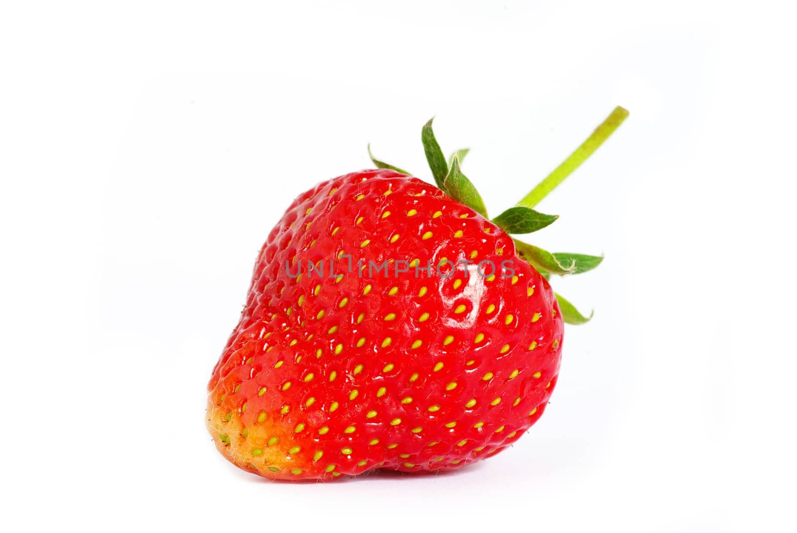 The strawberry isolated over white