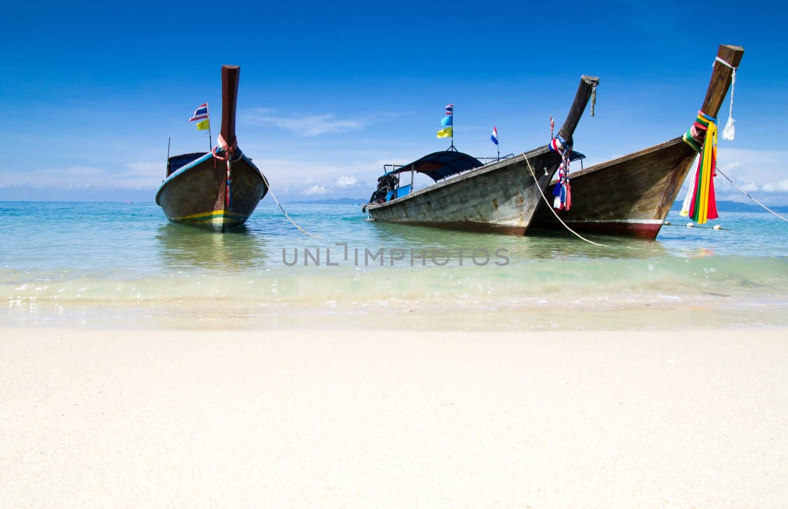 Tropical beach, longtail boats, Andaman Sea, Thailand
