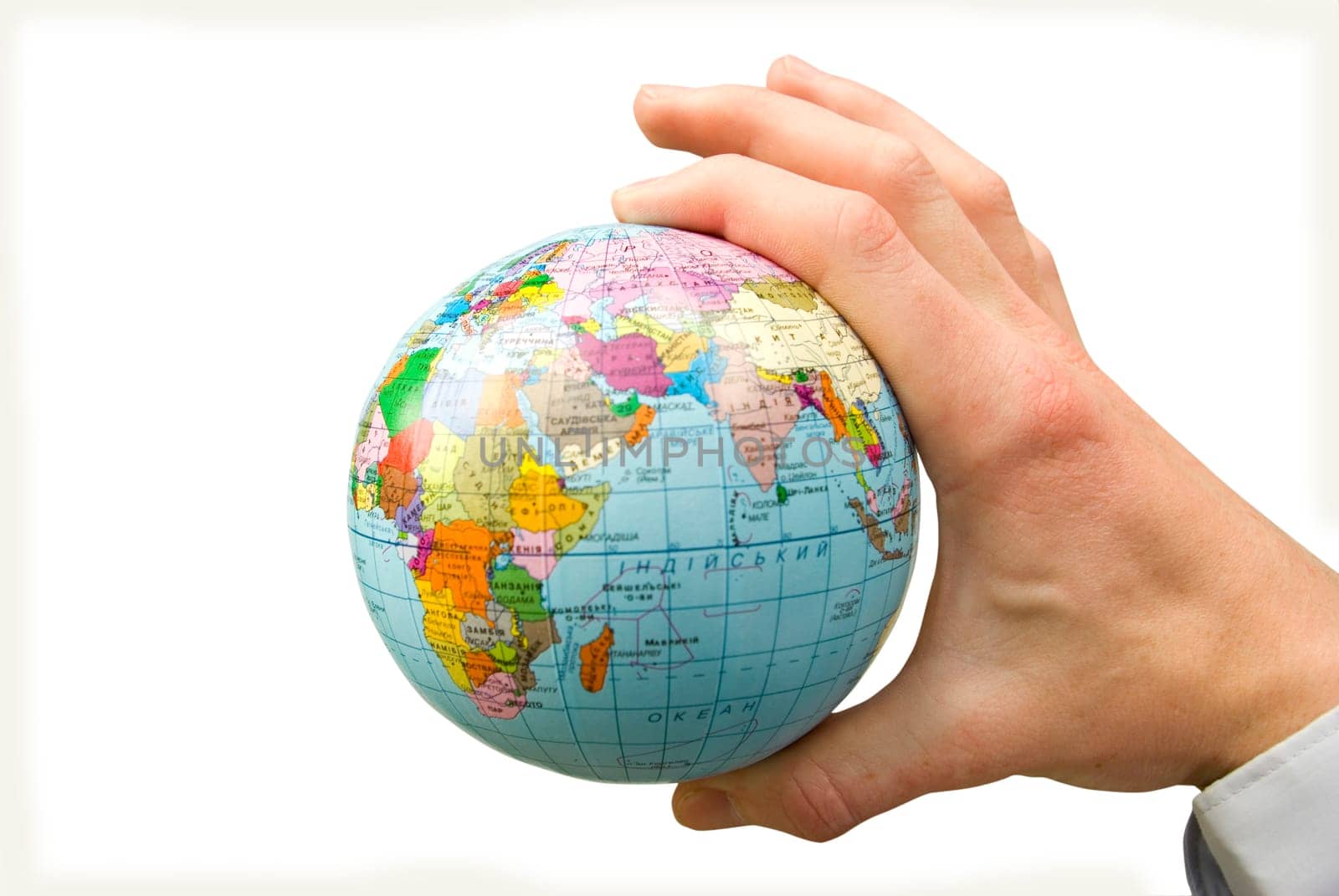 Hand holdings a globe on a whiteness