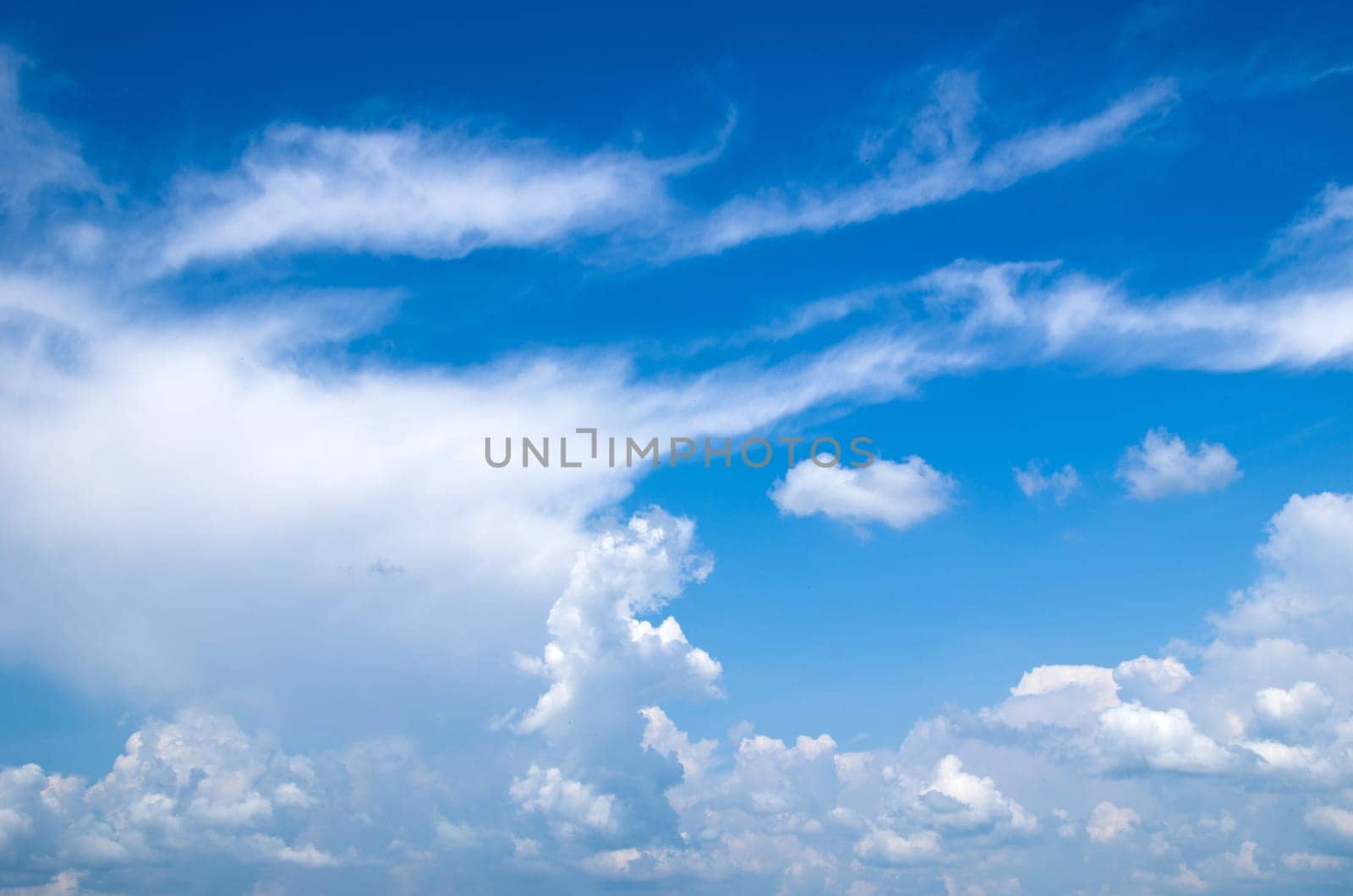 blue sky is covered by white clouds