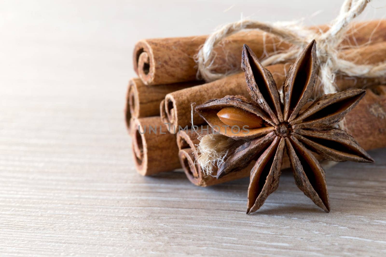 anise and cinnamon, on wooden table..