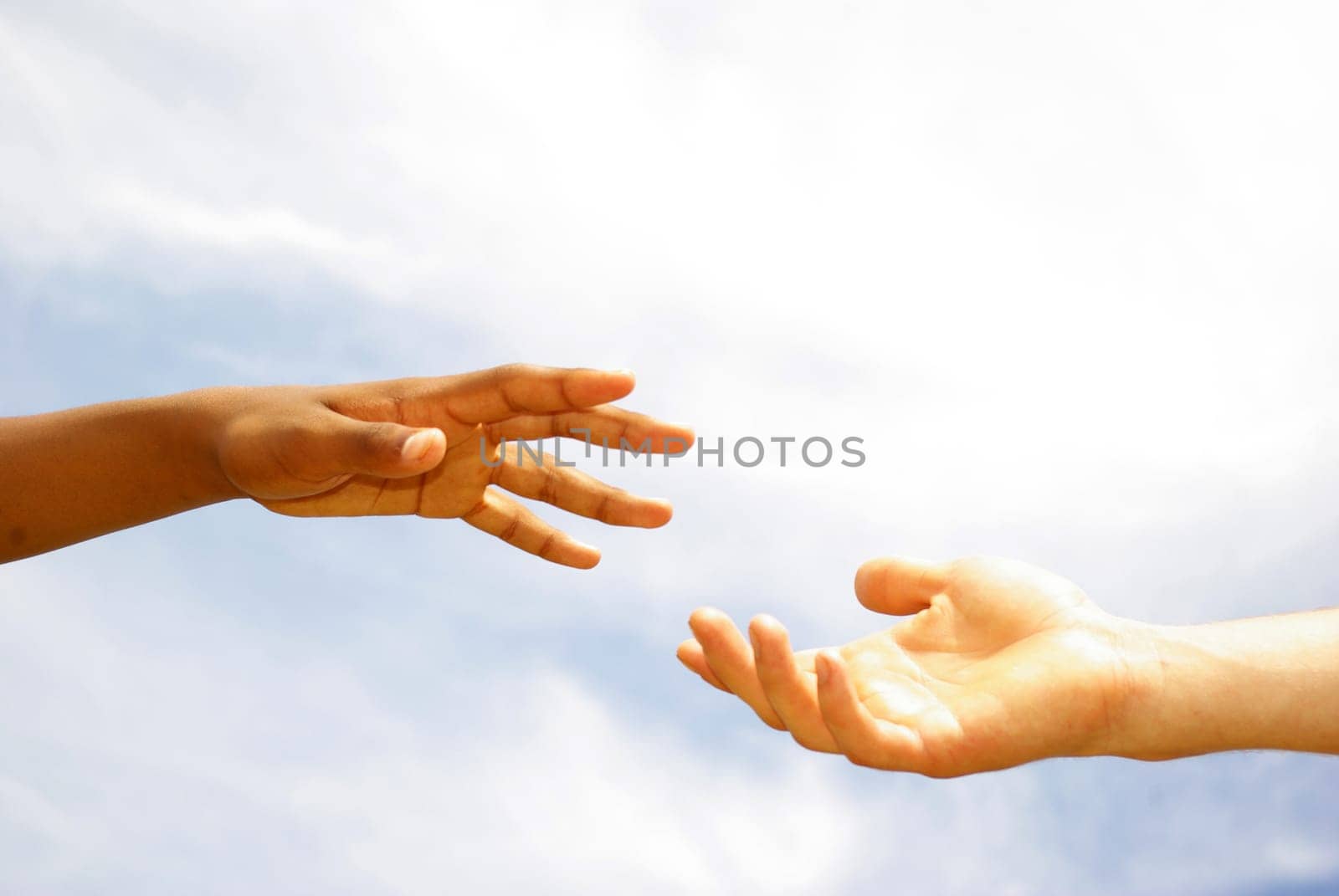 helping hand with the sky background