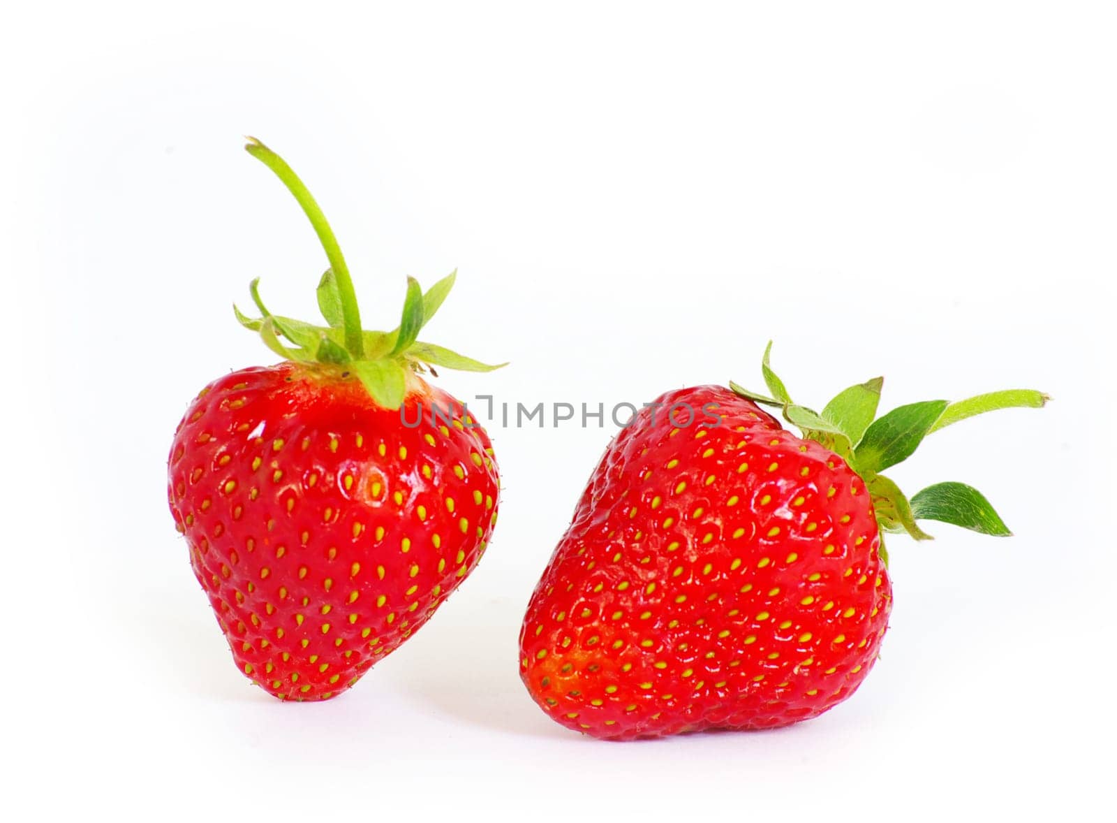 The strawberry isolated over white