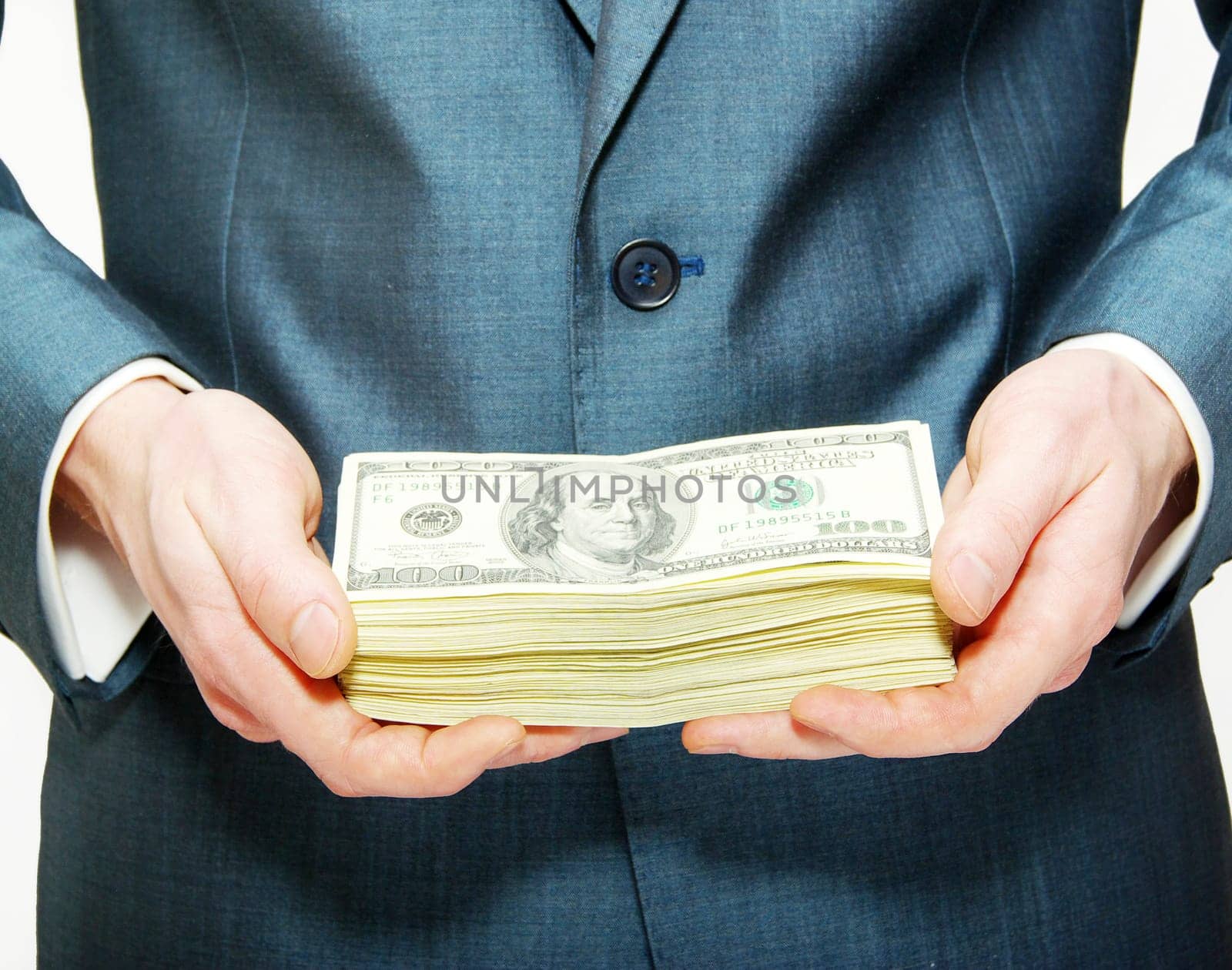 Hand with money isolated on white background